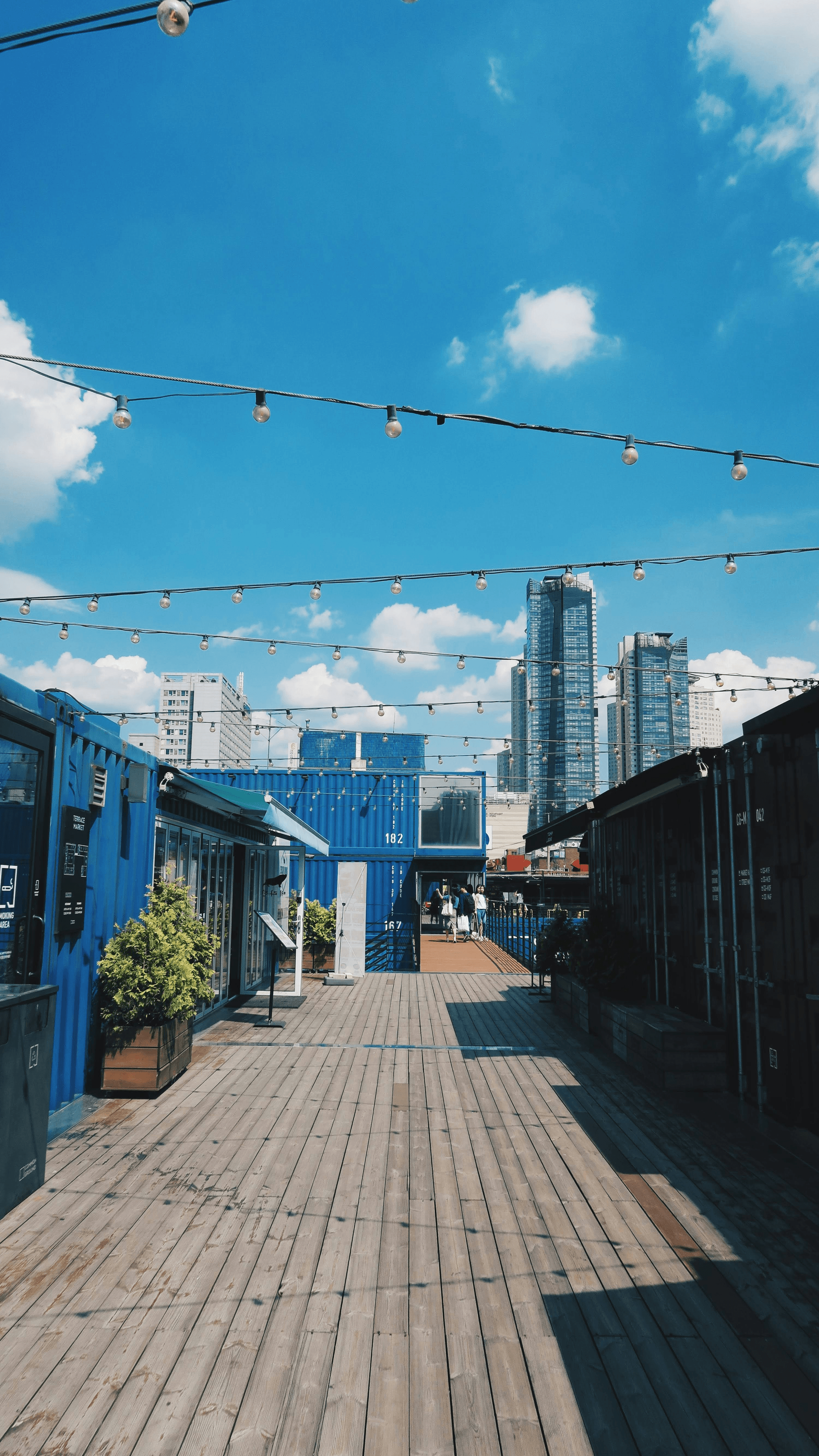 Eco-friendly elements in a vibrant shipping container bar