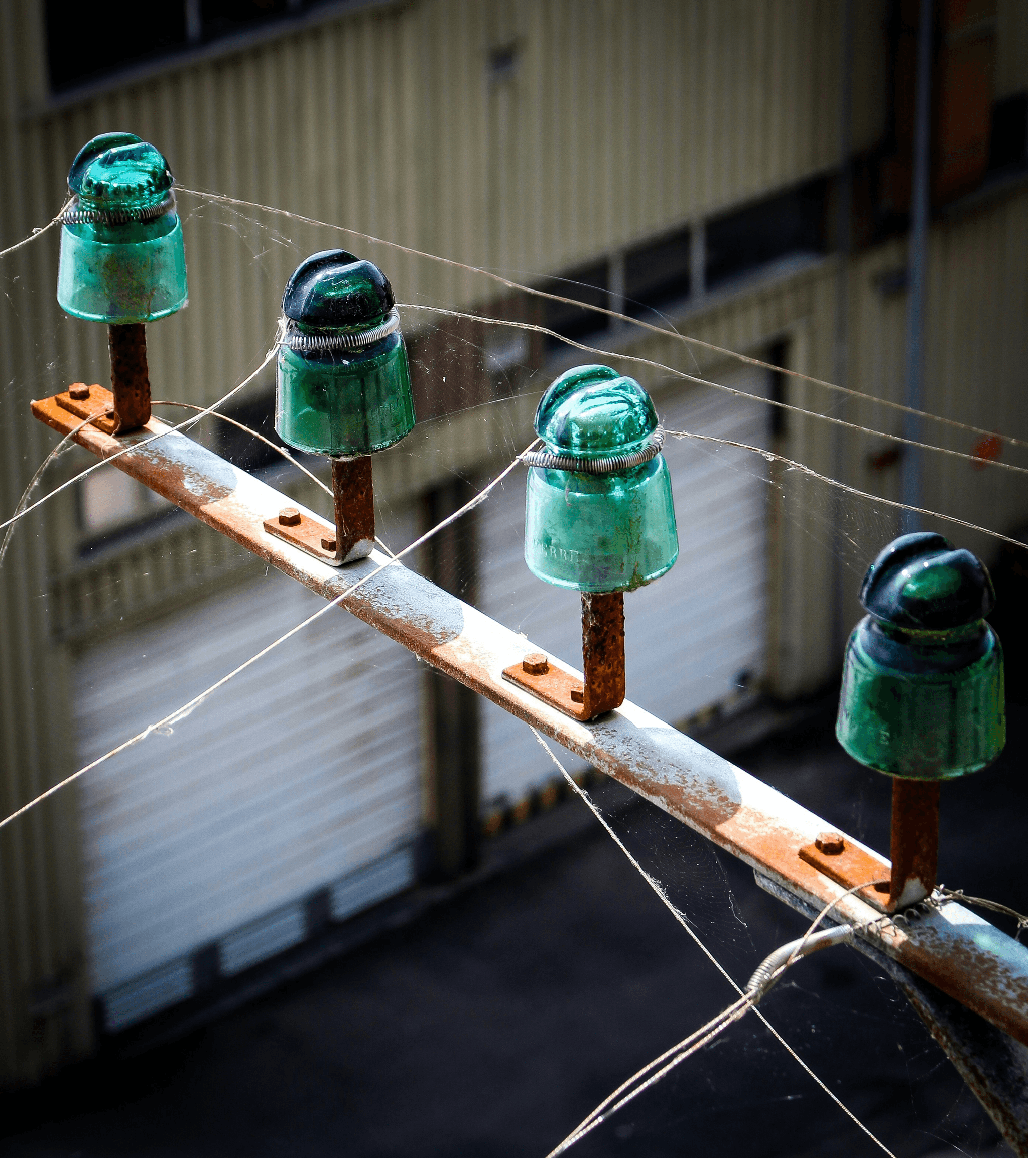 is porcelain an insulator? Spark fittings on ceramic power line insulators.