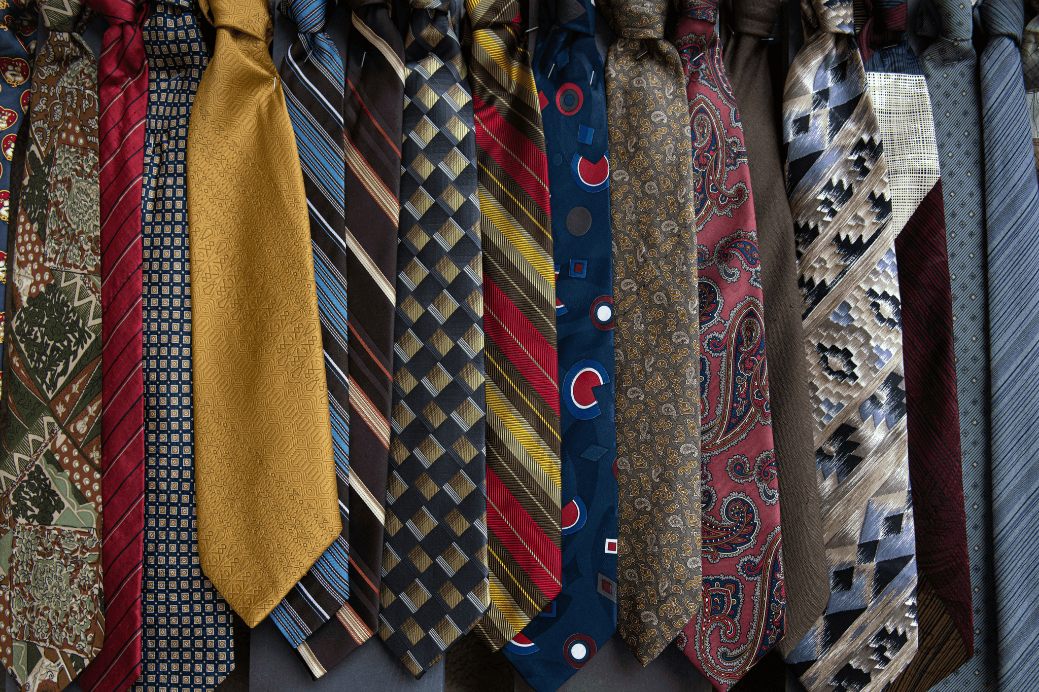 Neckwear Inspection showcasing diverse styles of ties and scarves.