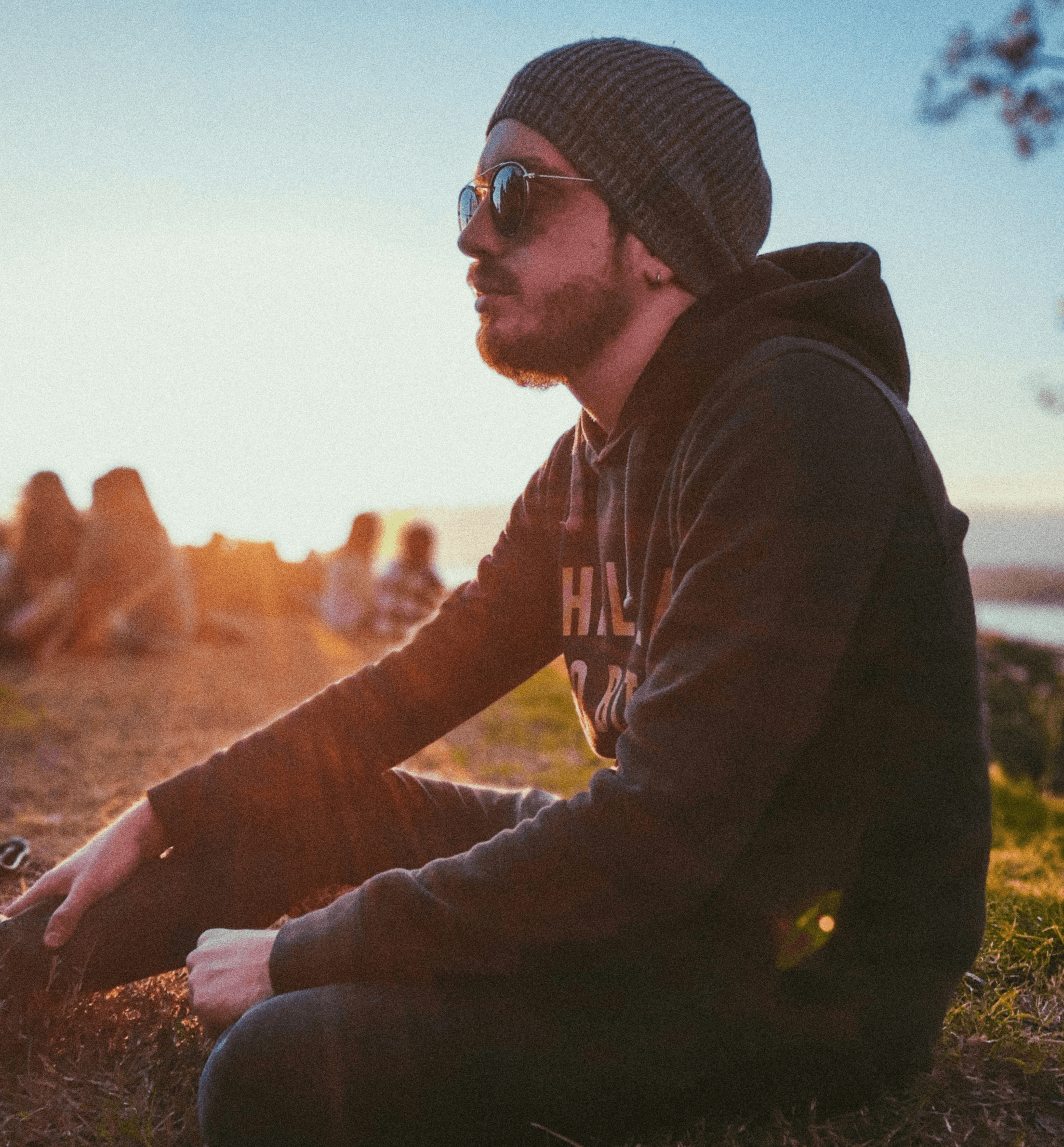 Bulk custom sunglasses being distributed at outdoor music festival