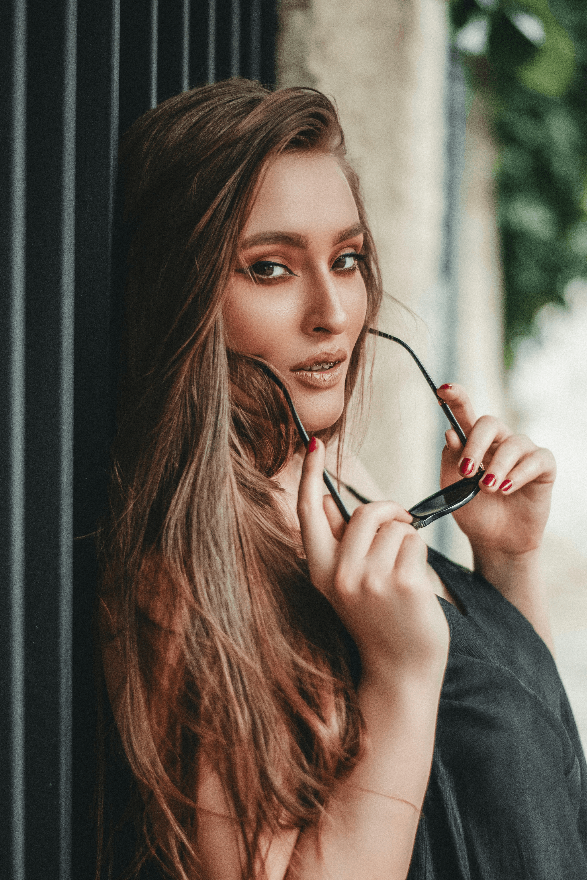 Attractive woman with diamond face shape wearing stylish eyeglasses