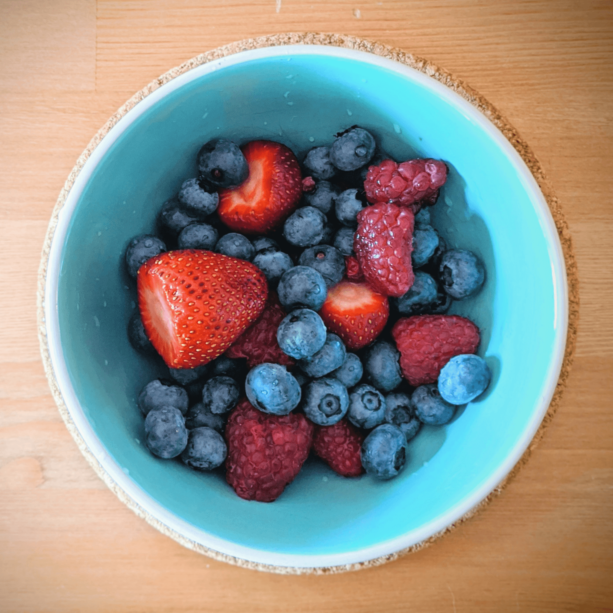 fresh assortment of freeze dried organic fruit in colorful bowls