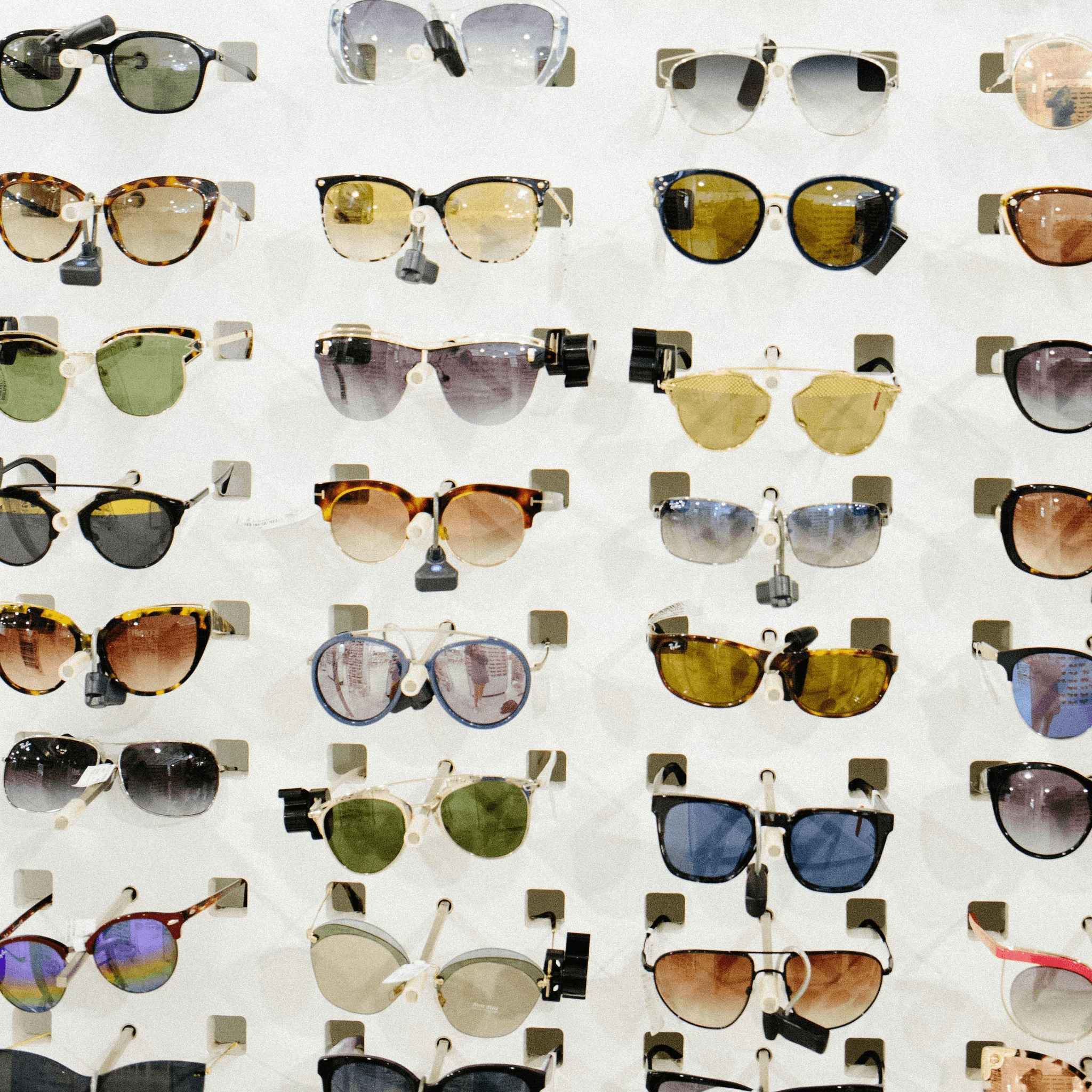 make your own sunglasses collection displayed attractively