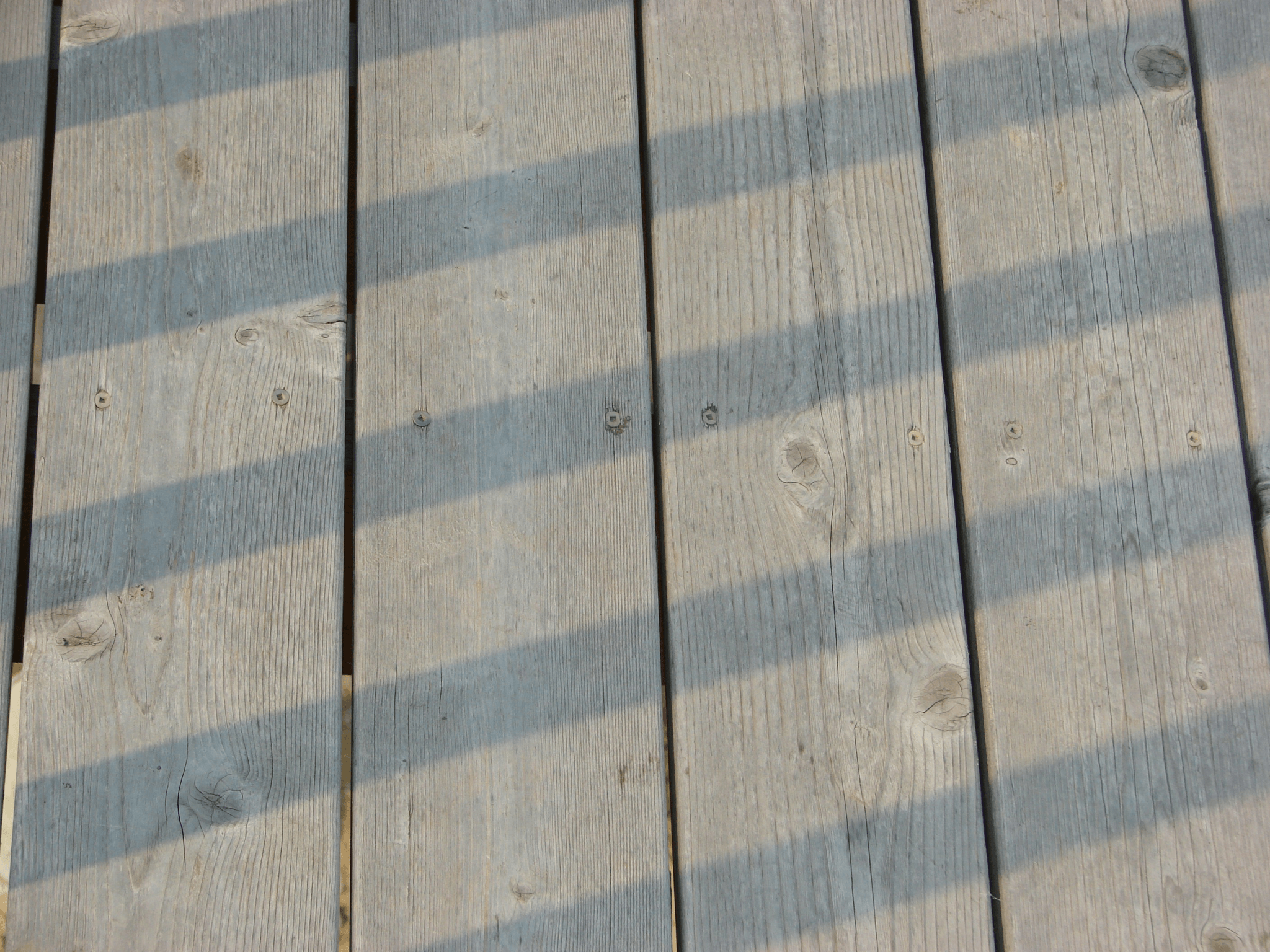 how to remove scratches from composite decking effectively