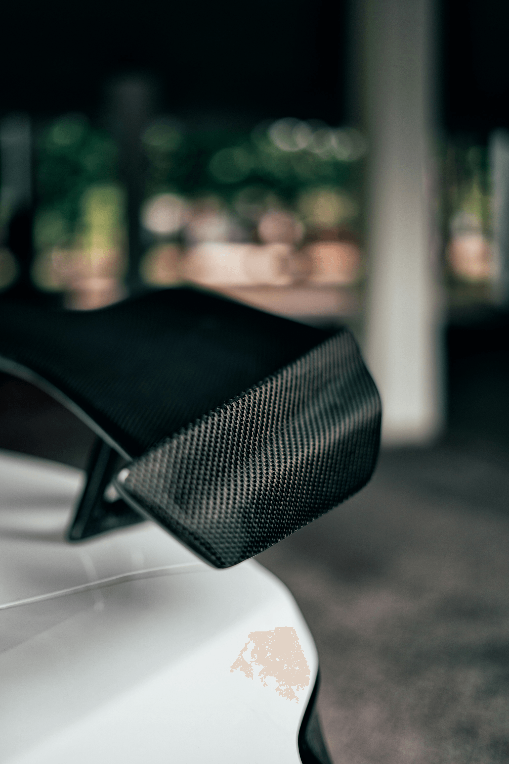 bottom plastic part of car providing protection and aerodynamics.