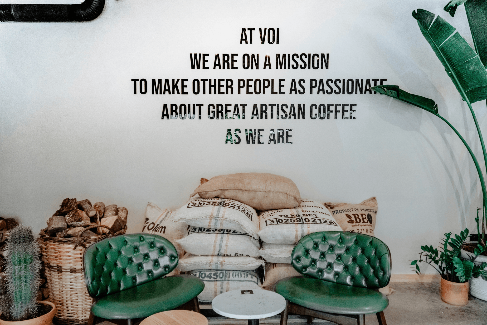 Container Coffee Shop Design with Hanging Seating and Vertical Gardens