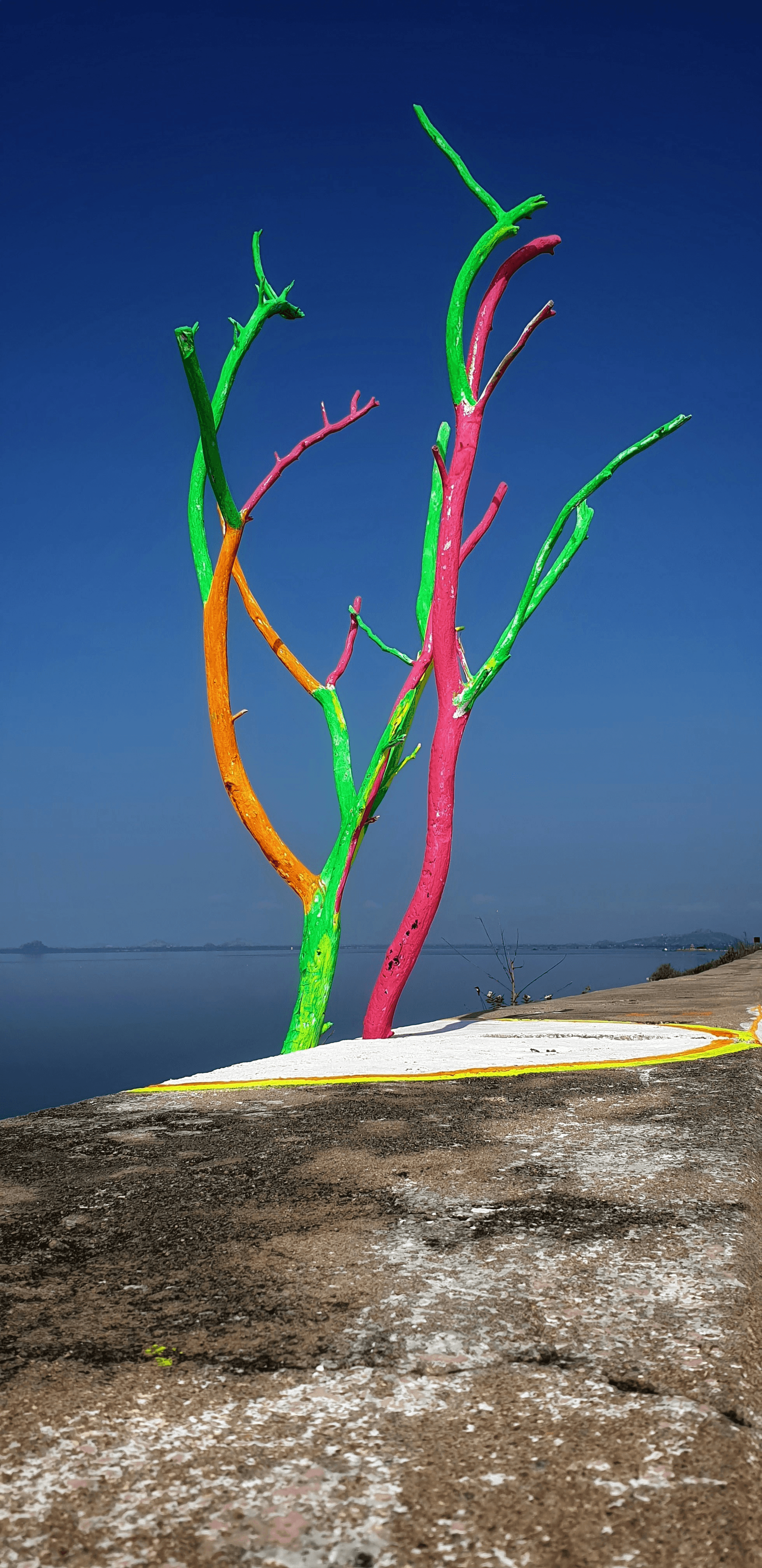 Artist using eco friendly resin for vibrant art creation