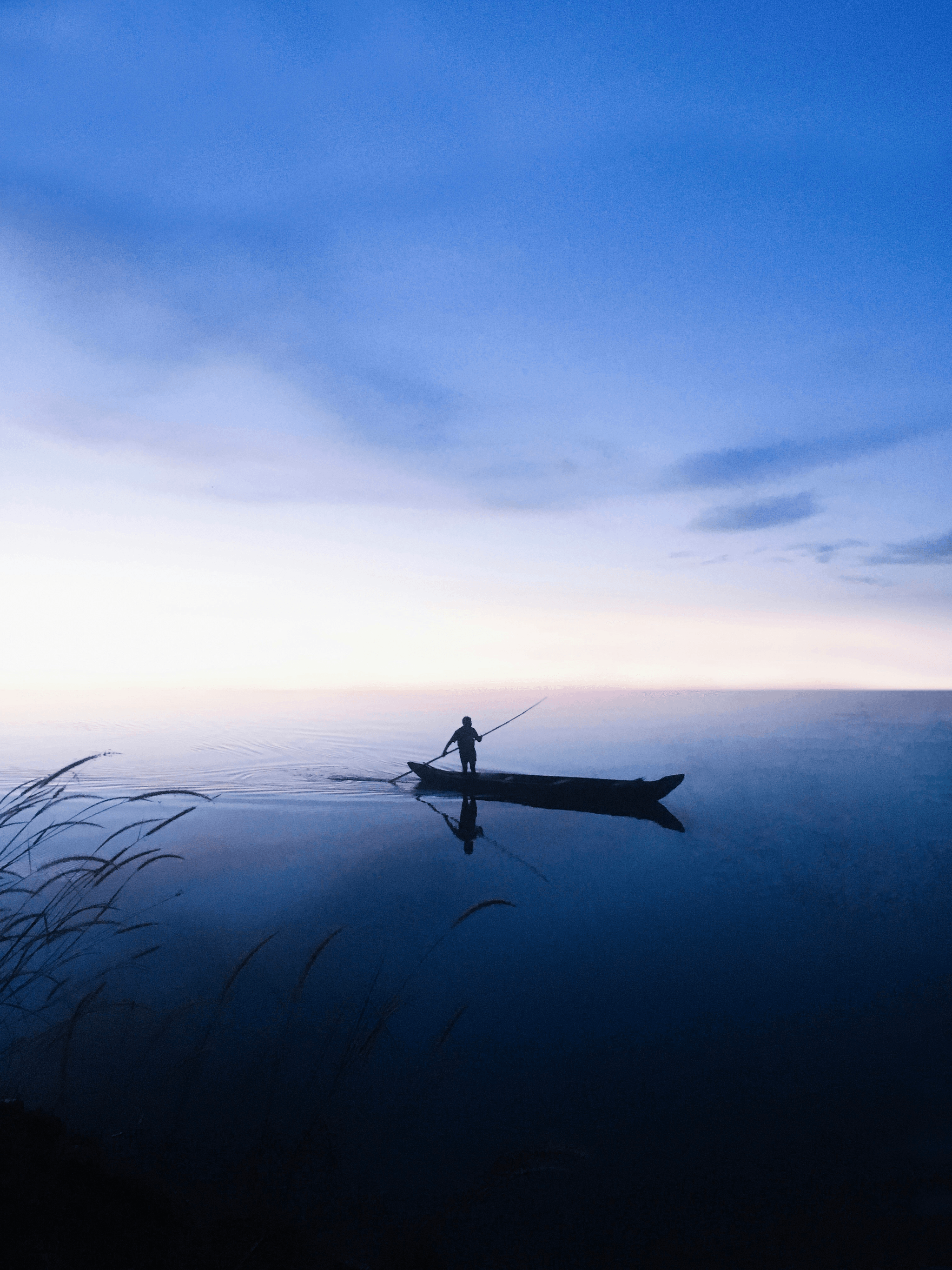cheap aluminum boats illustration on calm waters