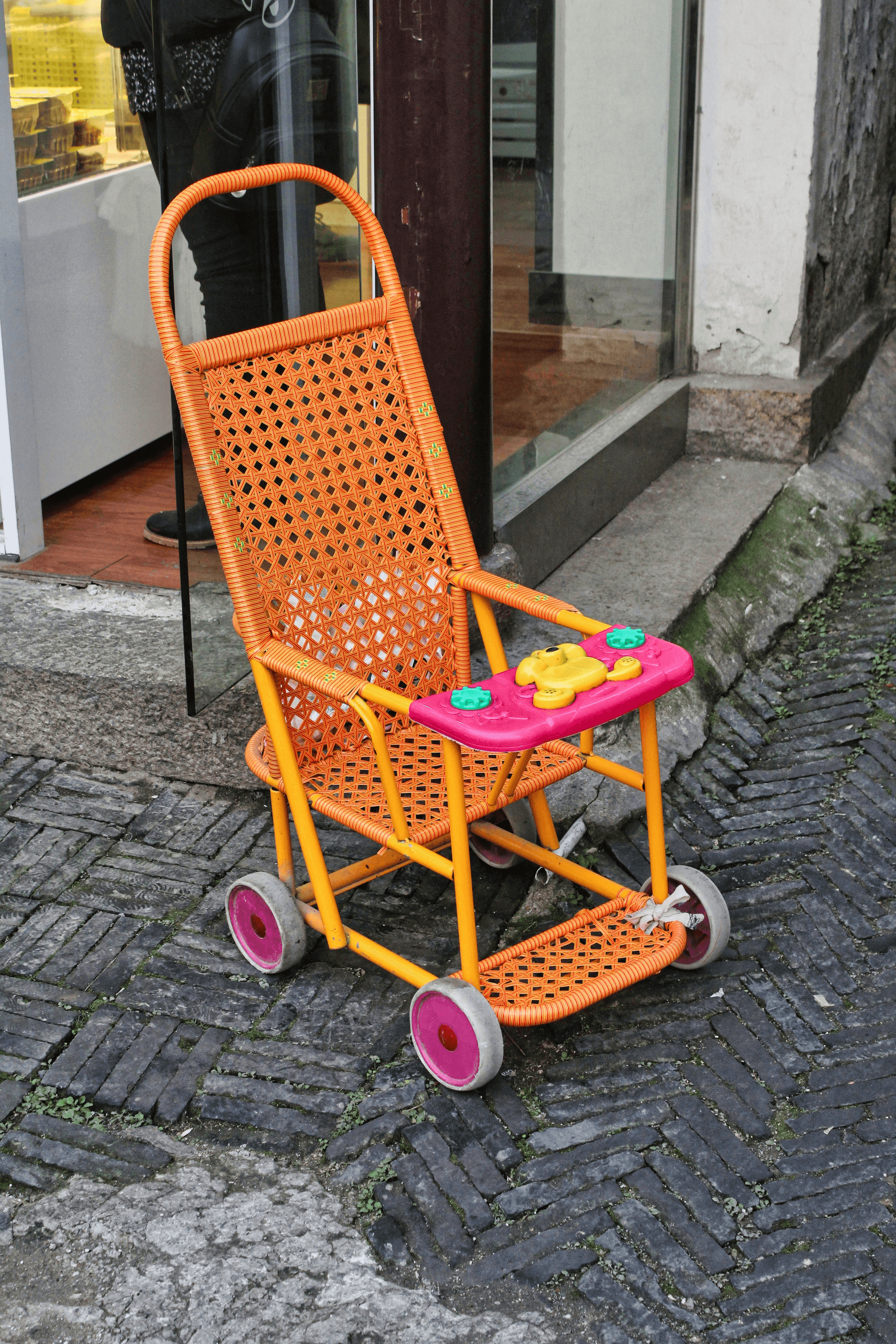Baby stroller parts inspected for safety standards compliance.