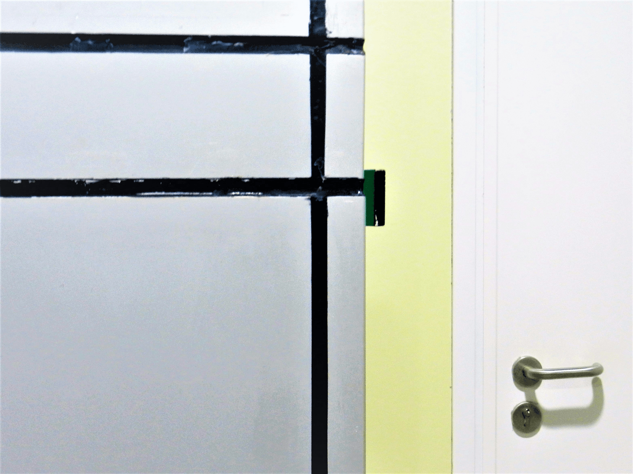 Weatherproofing exterior doors with laminating adhesive