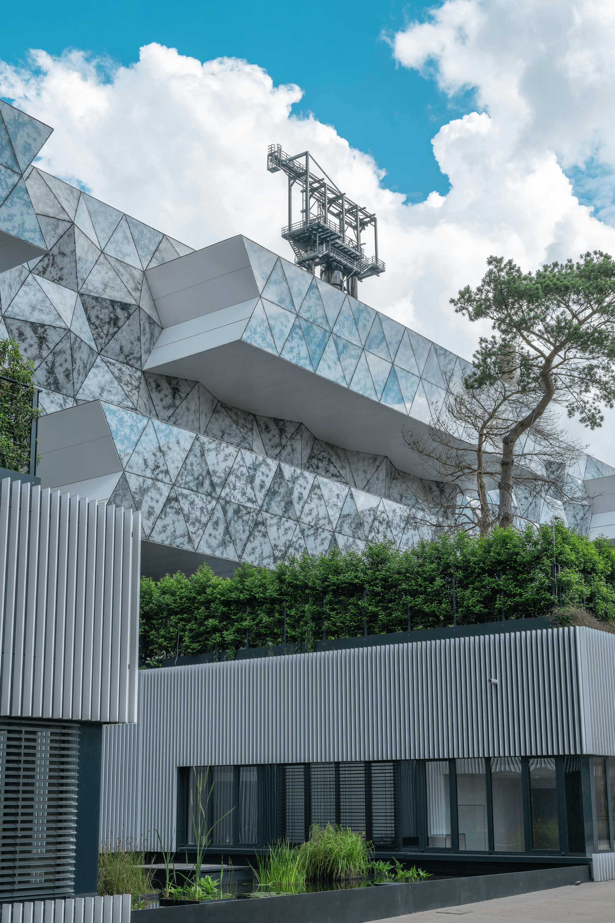 Modern prefab office building surrounded by greenery