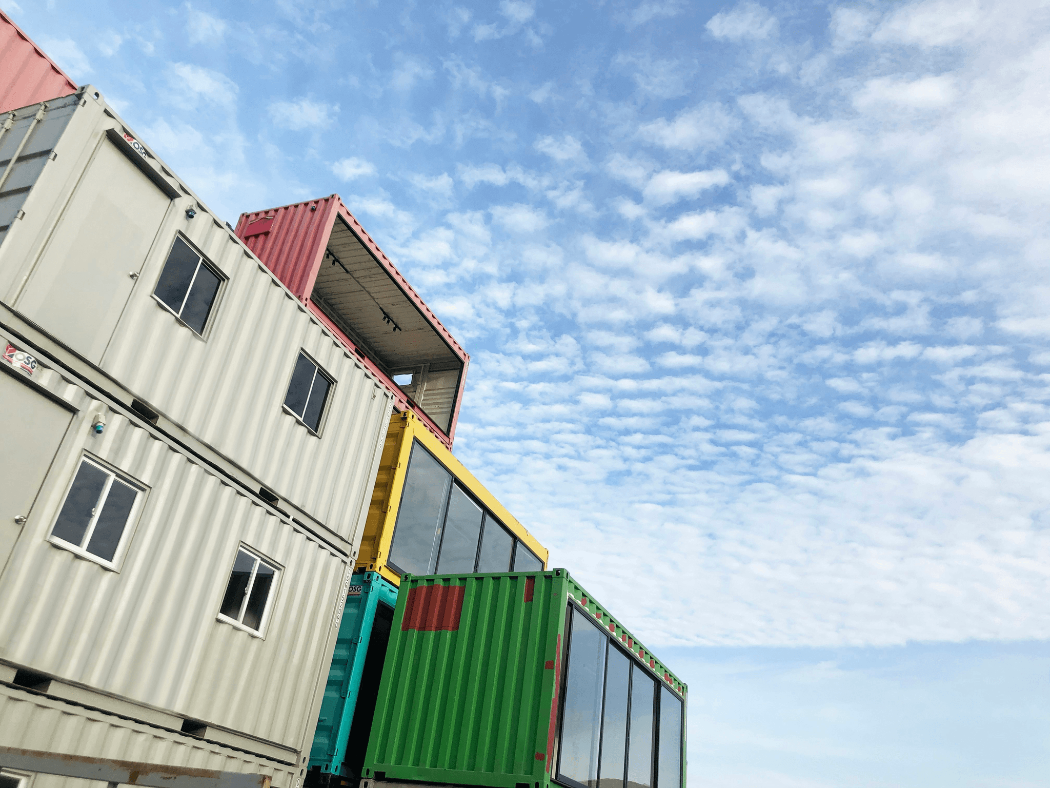Varieties of flat pack shipping container