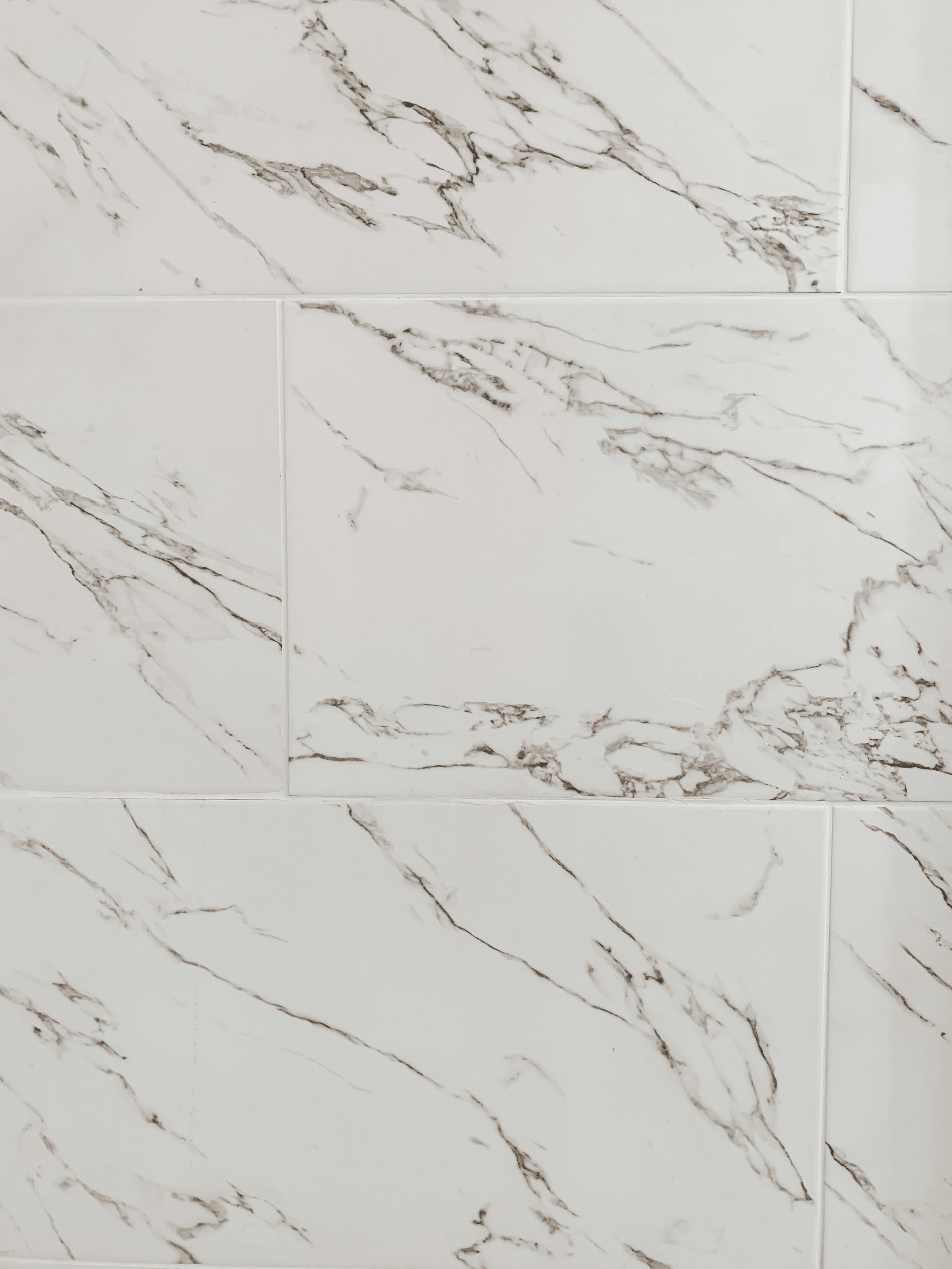 Stylish marble shower floor enhancing bathroom aesthetic