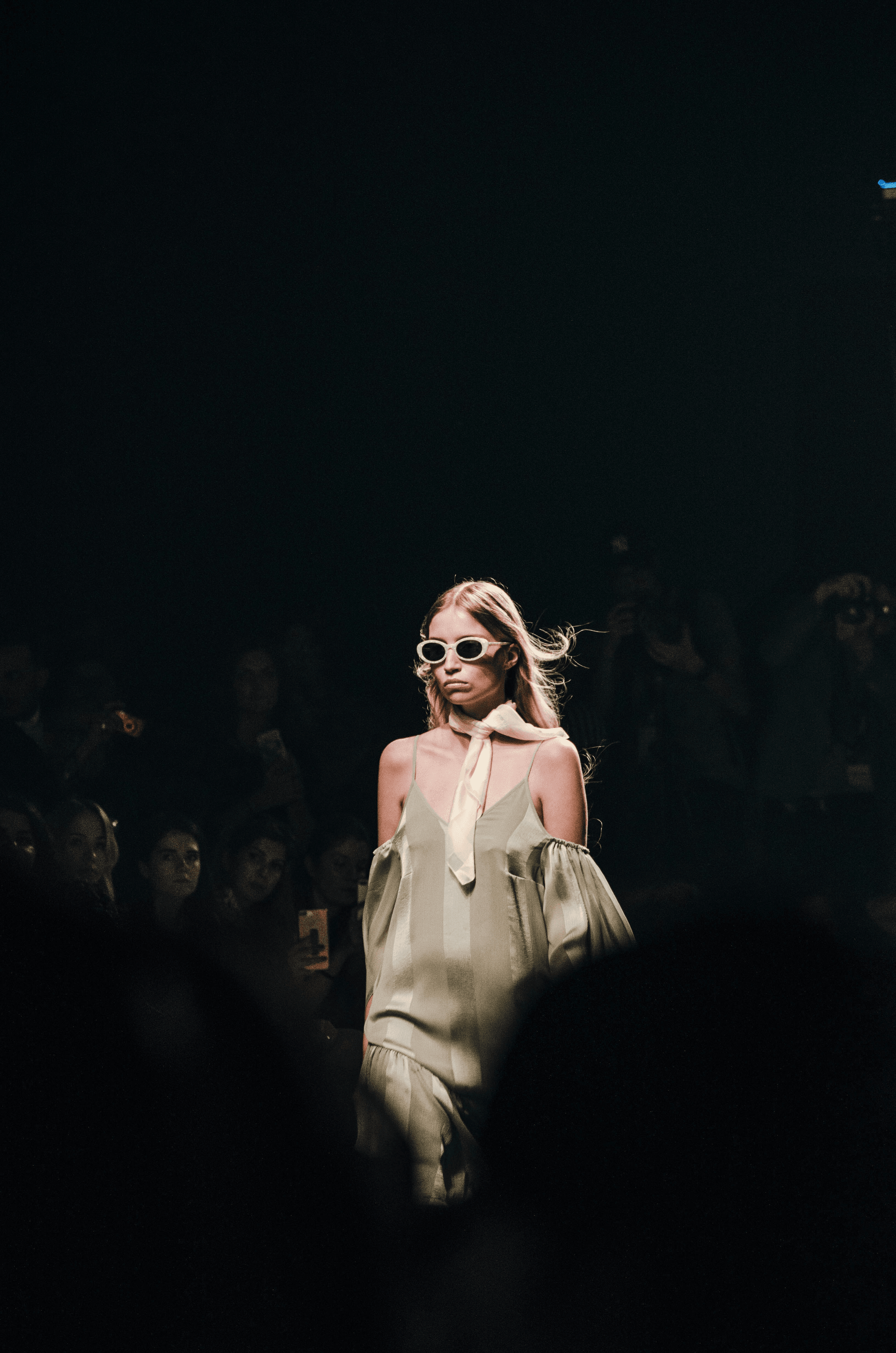 trending eyeglasses highlighted during a high-fashion runway show