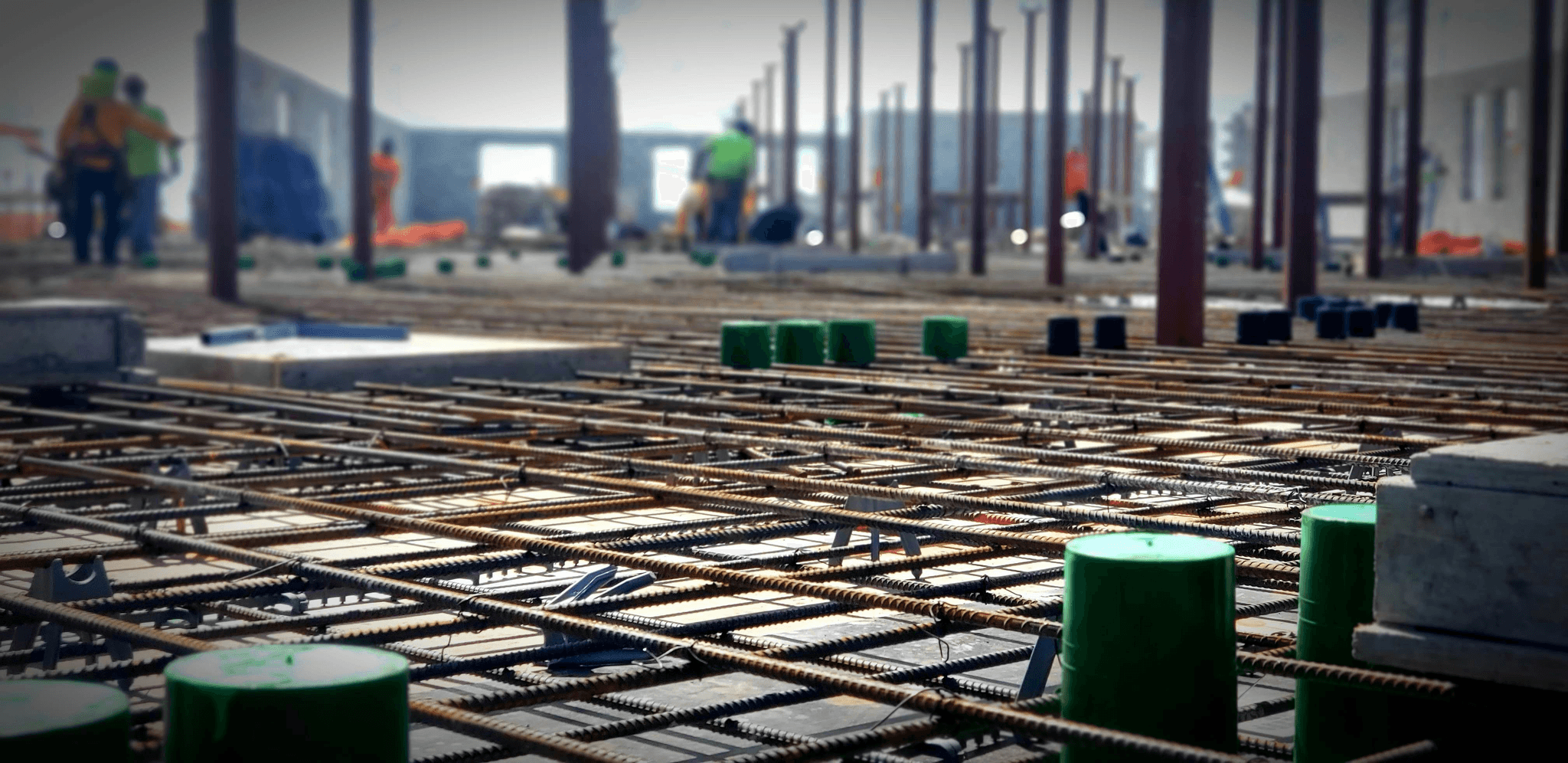 Recycled steel and concrete being used in prefabricated building construction