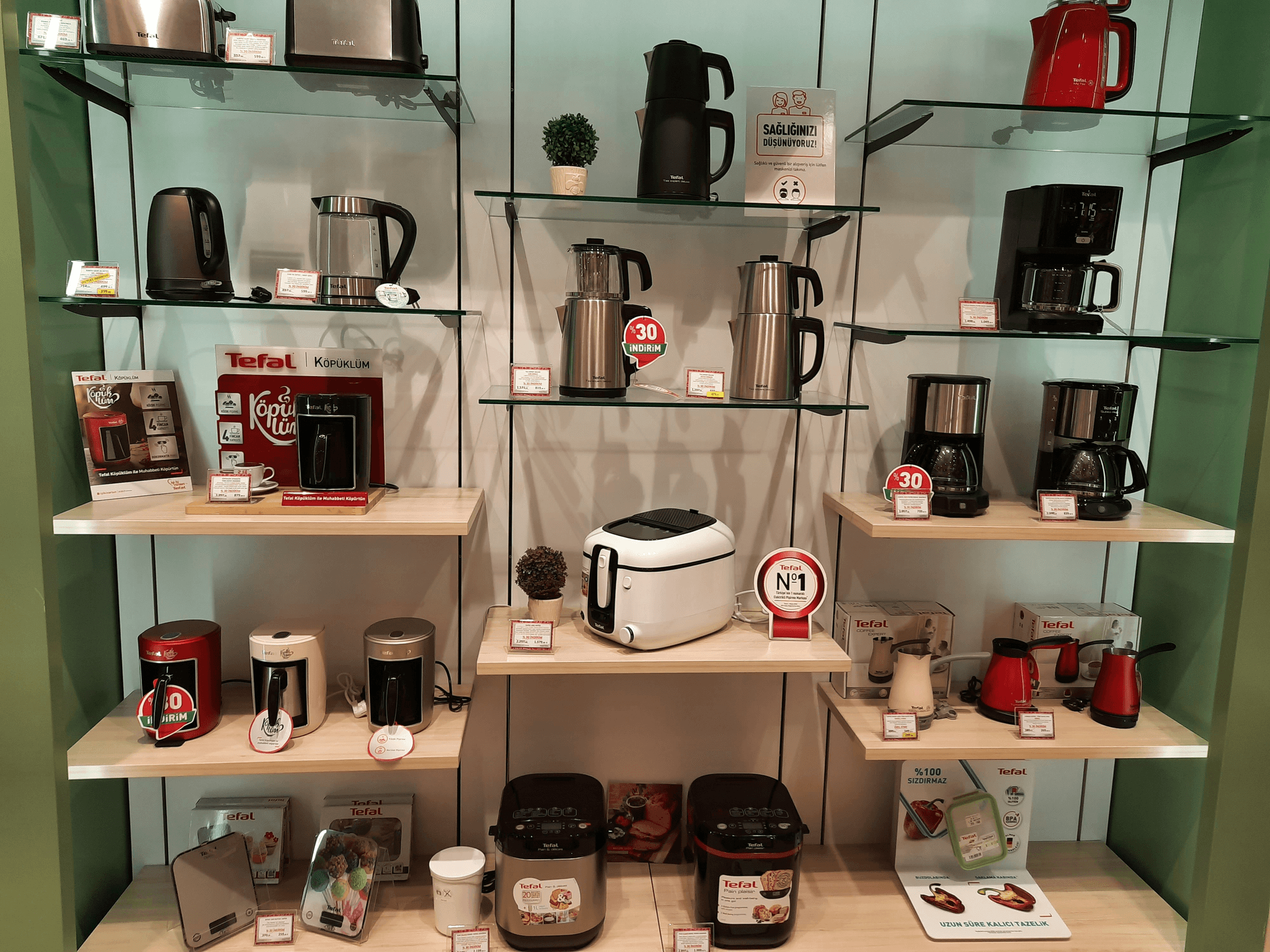 Modern energy-efficient kitchen appliances on display in a showroom