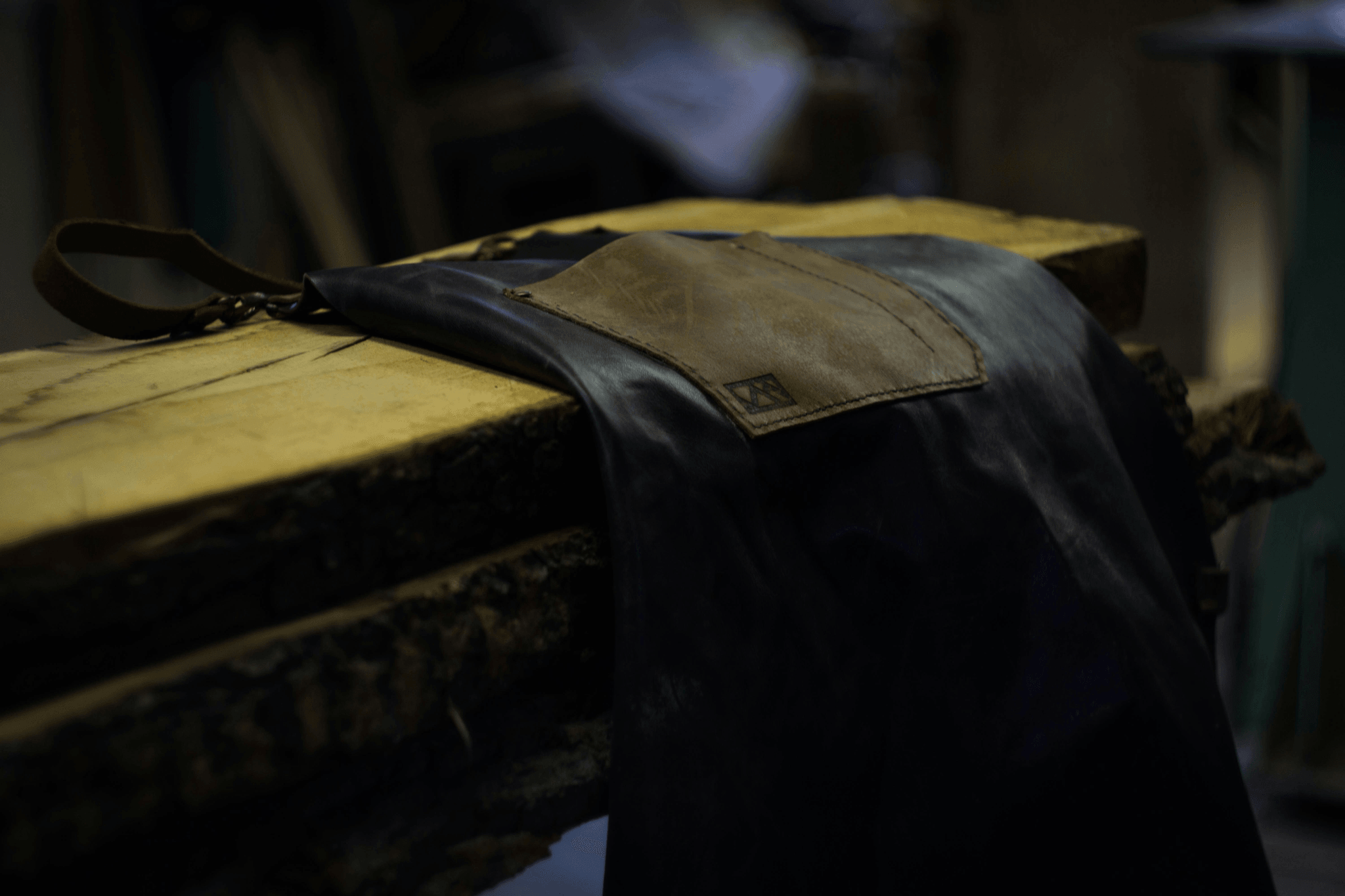 Inspection tests assessing load capacity in durable leather bags.