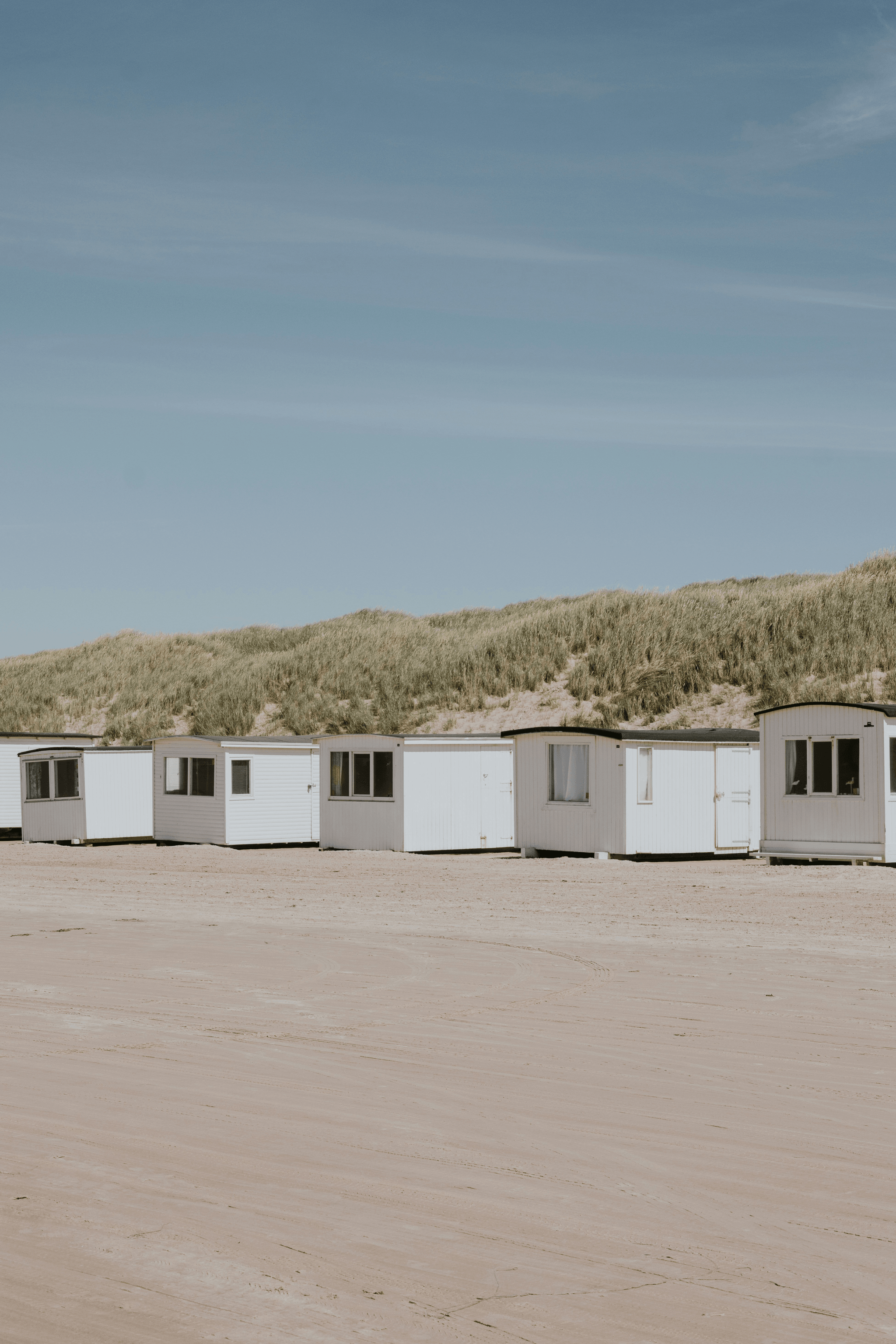 empty plot of land suitable for building a prefab container