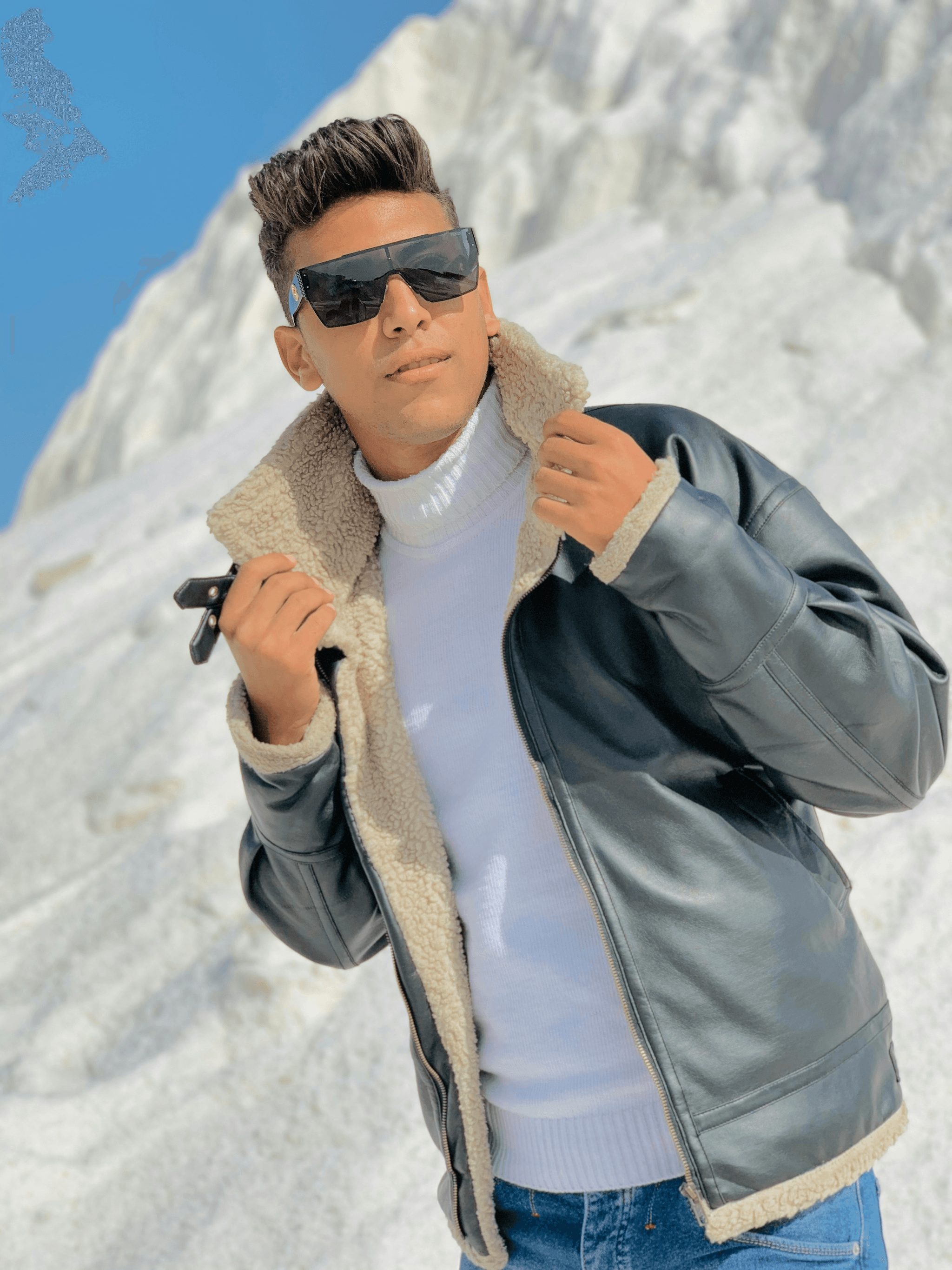 Stylish skier wearing cat 3 sunglasses on snowy slopes.