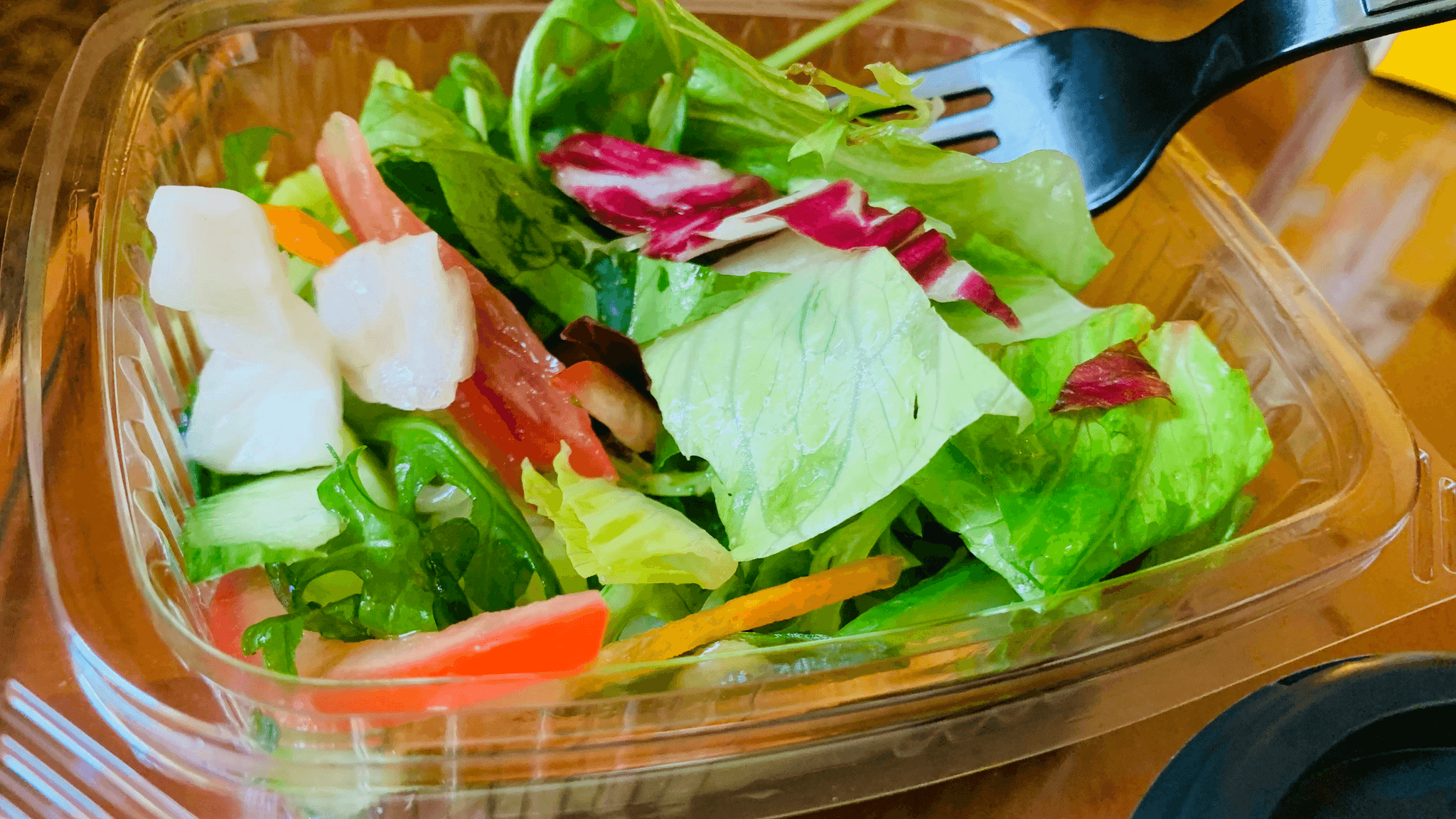 compartment to go containers showcasing vibrant salad ingredients