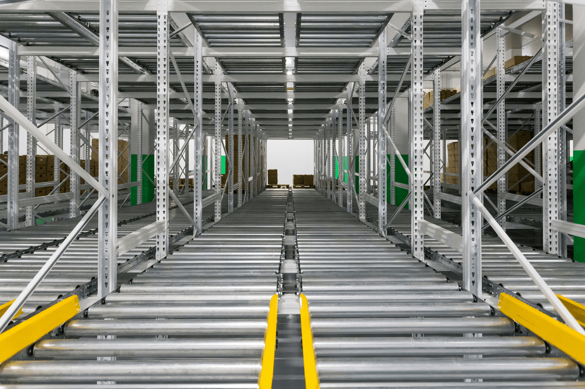 modern warehouse interior with adjustable shelving units and conveyor belts.