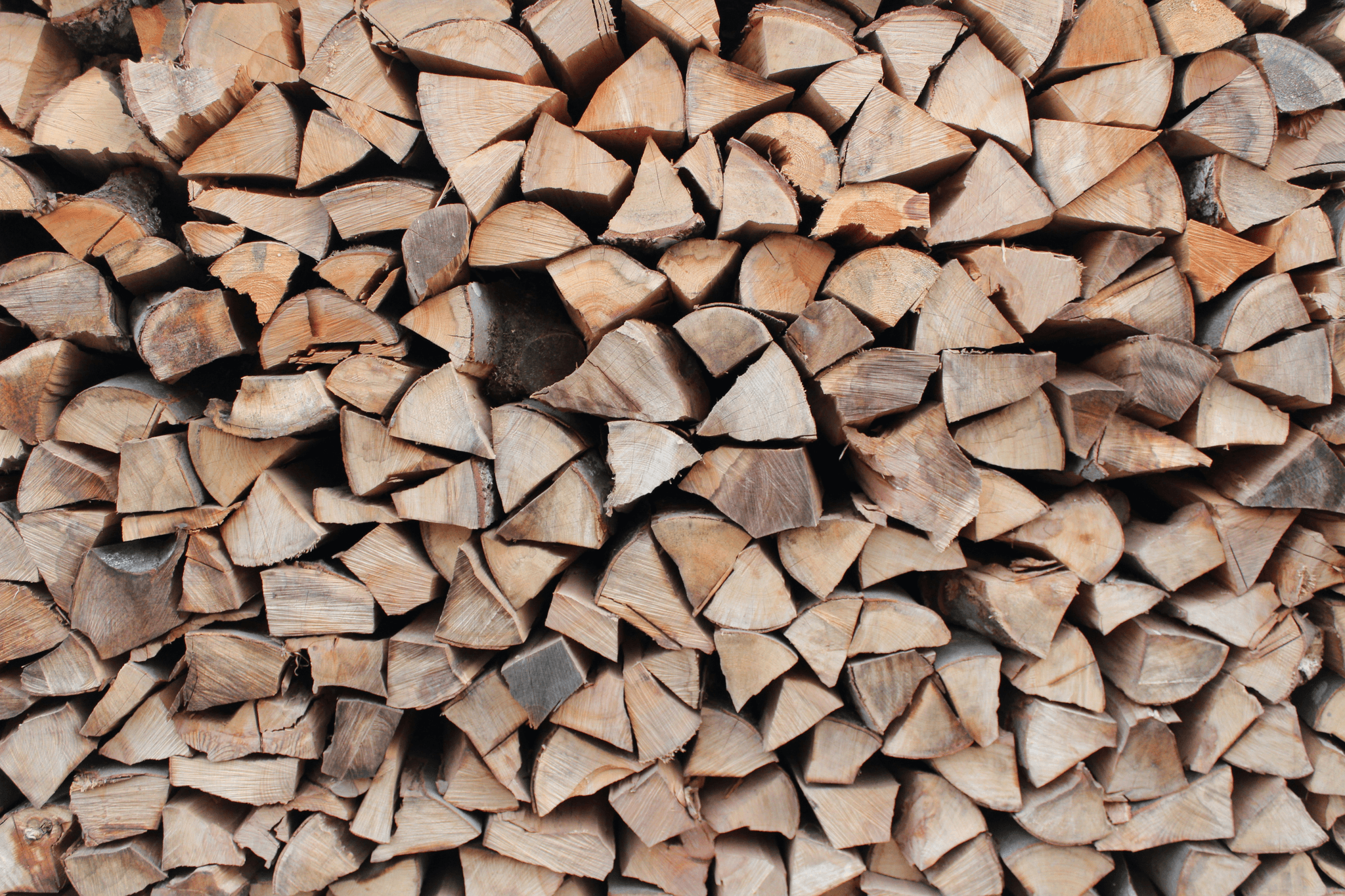 a freshly split firewood stack in norfolk