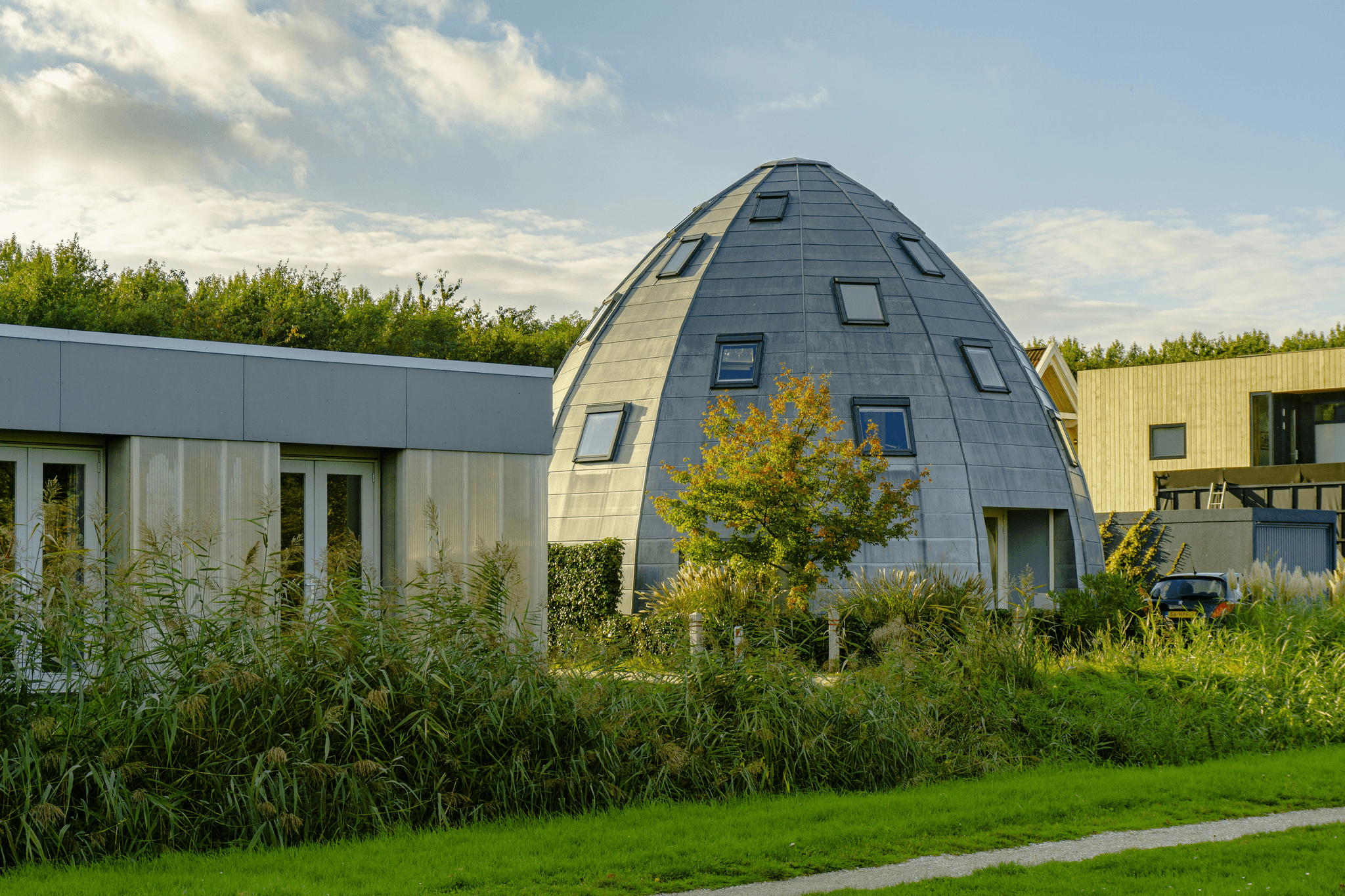 prefab dome homes surrounded by nature
