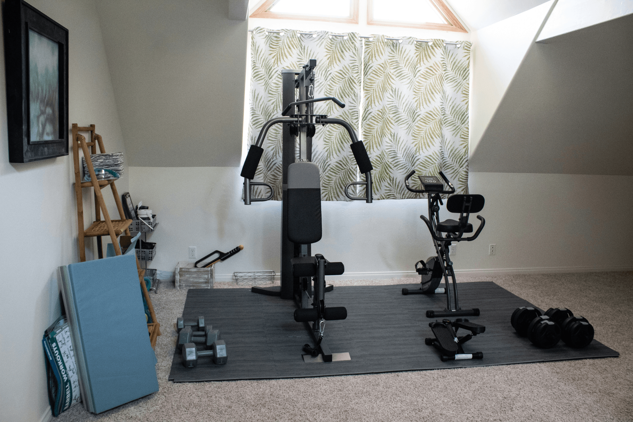 Modern home gym with natural light optimization at Homes Inc.