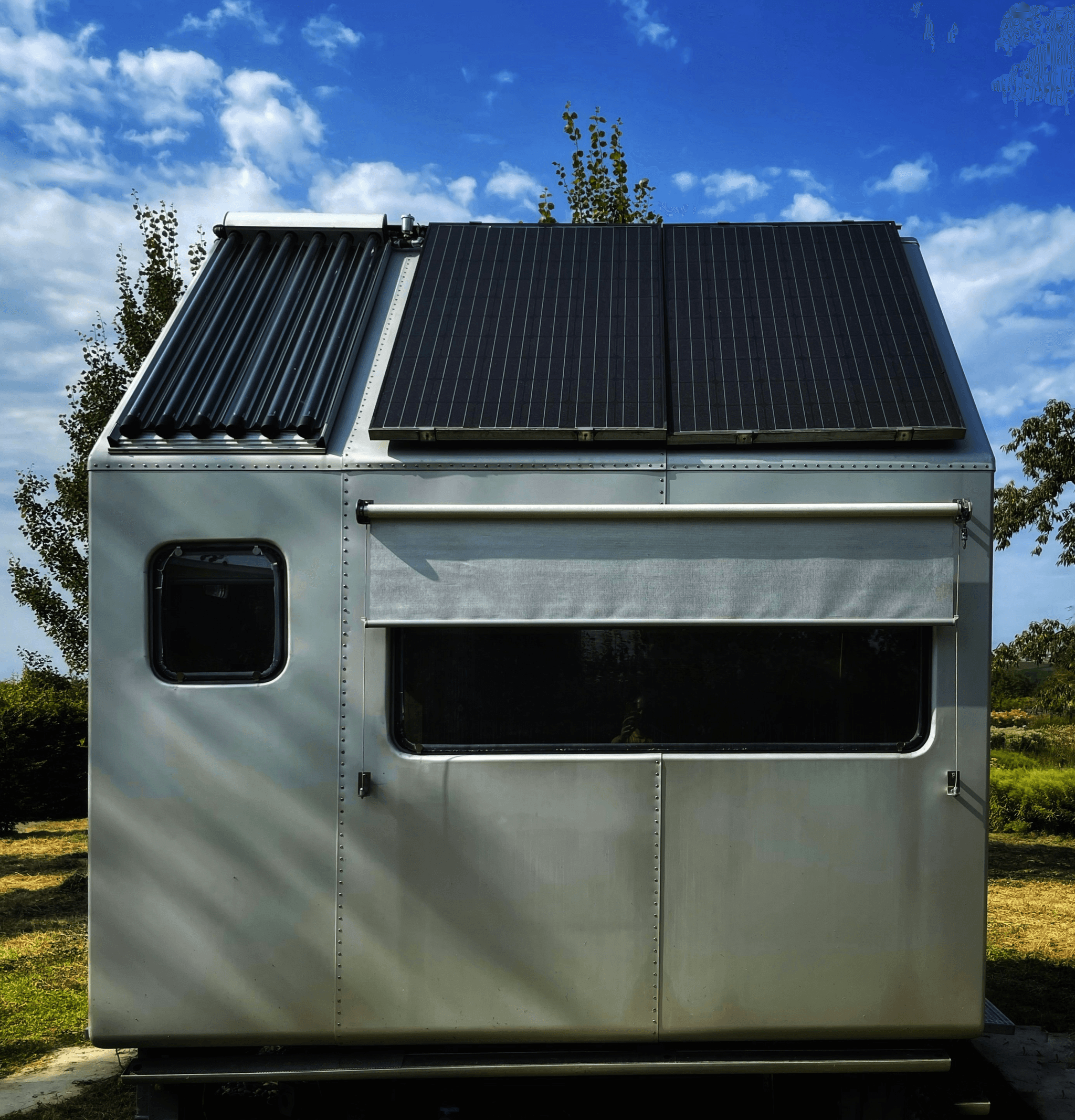Container Living: Solar Panels on Modern Home