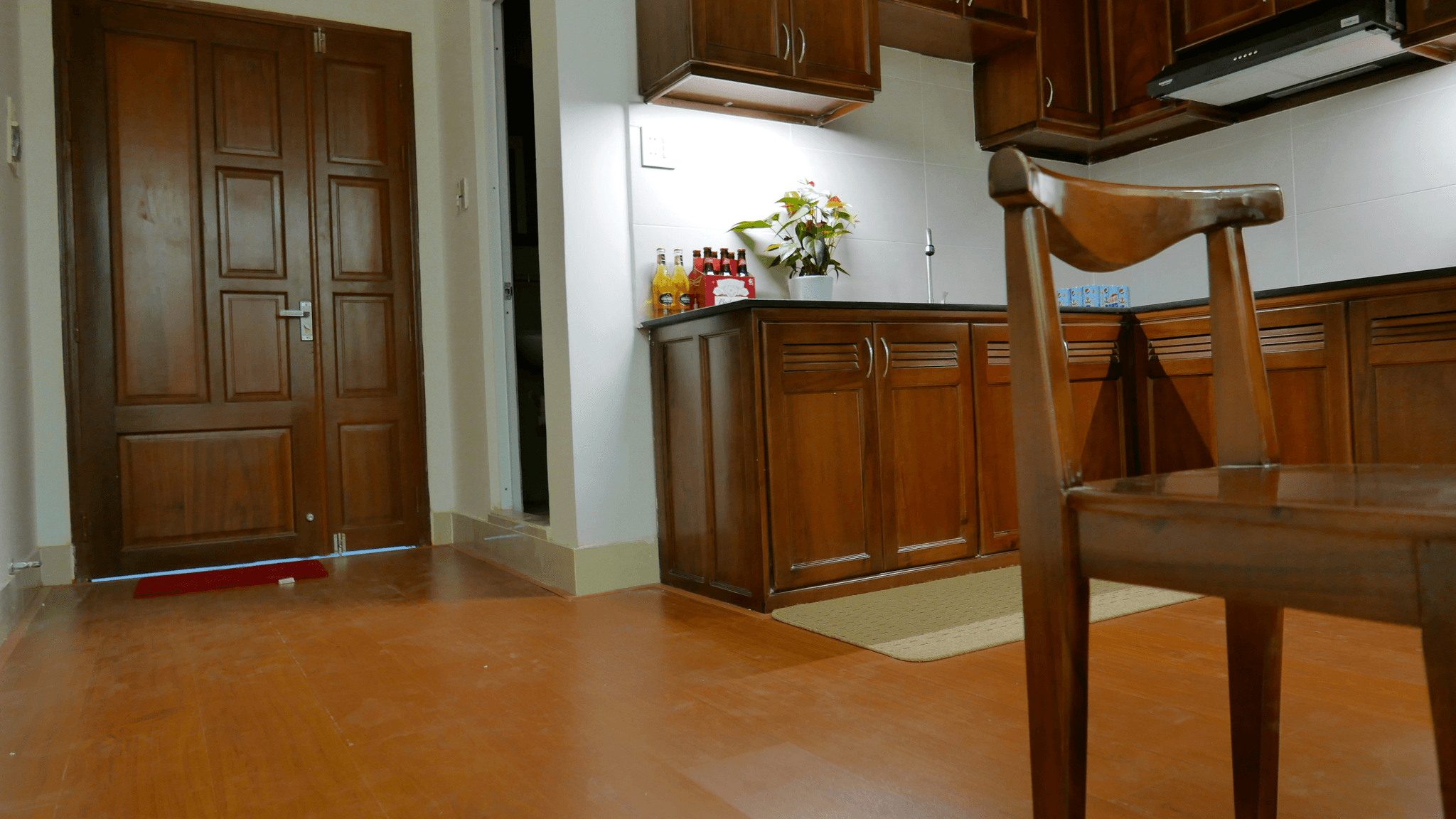 Wood-Look Tile Flooring Adds Natural Aesthetic to Modern Kitchen - Types of Tile Flooring