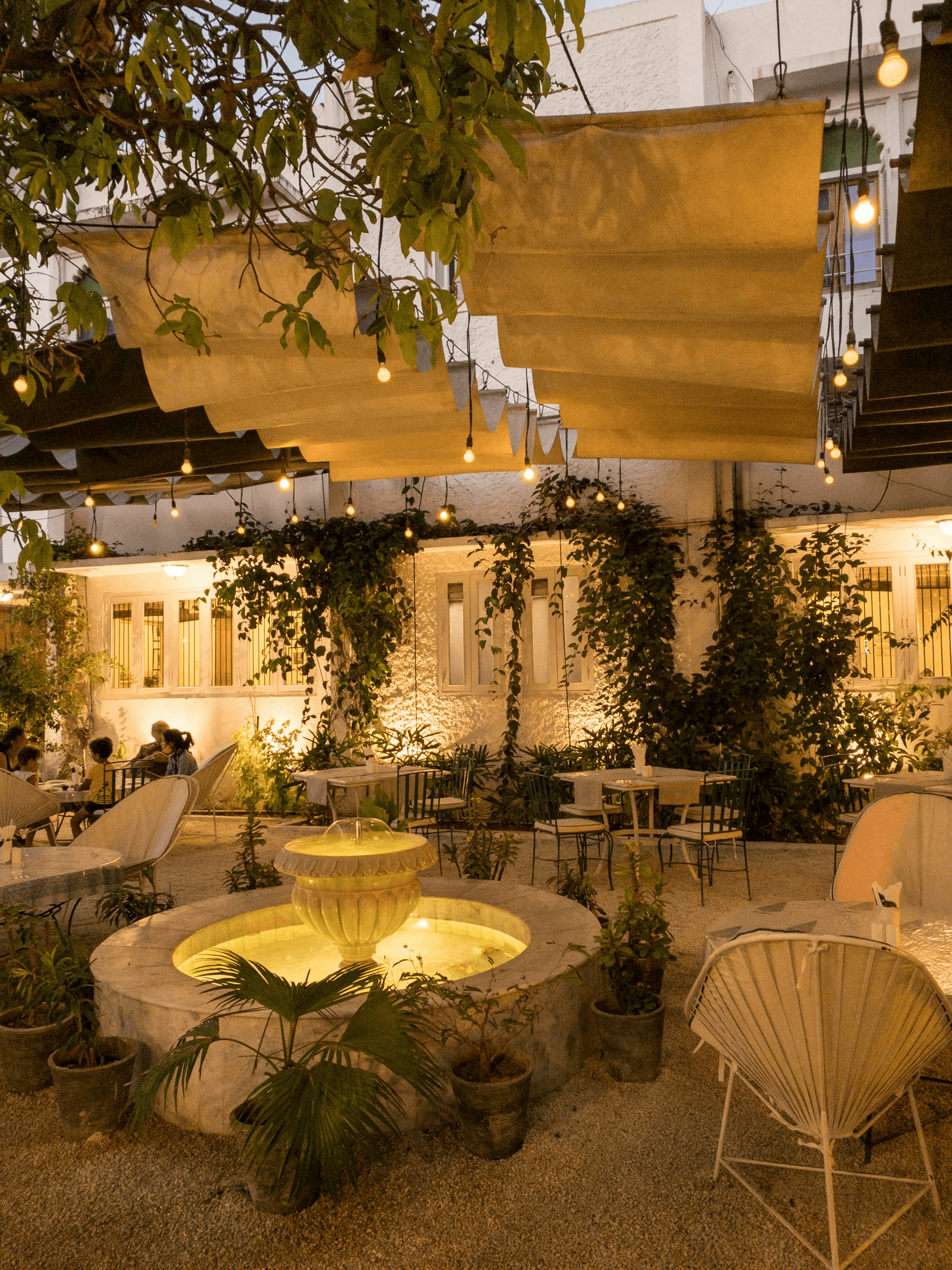 a cozy outdoor patio with garden elements