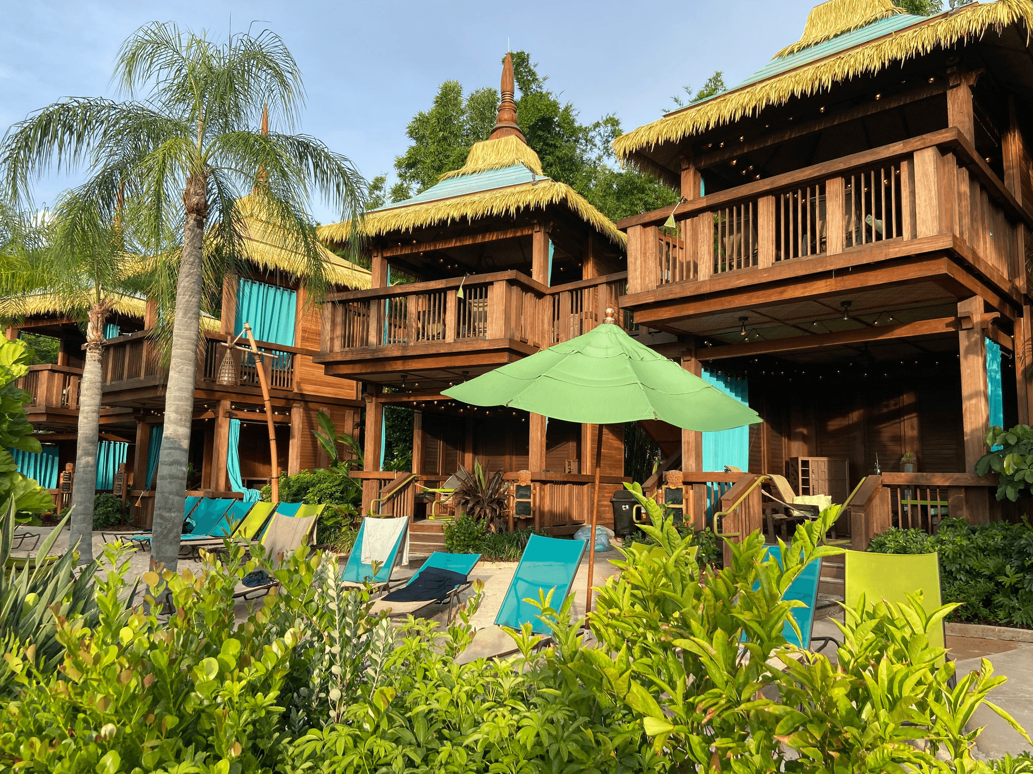 Image shows a traditional joglo style wooden villa accommodation resort