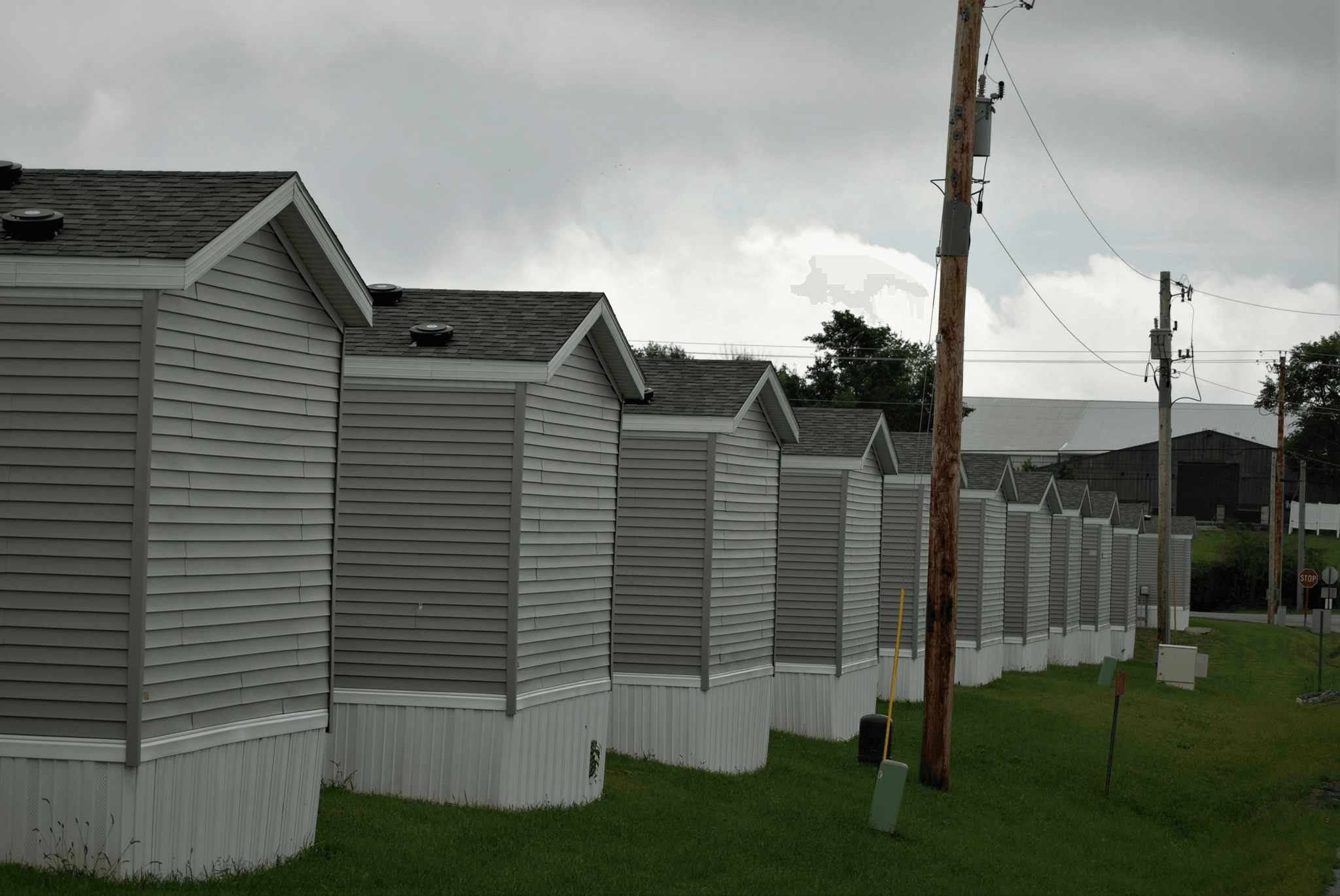 Diverse neighborhood with manufactured homes for sale