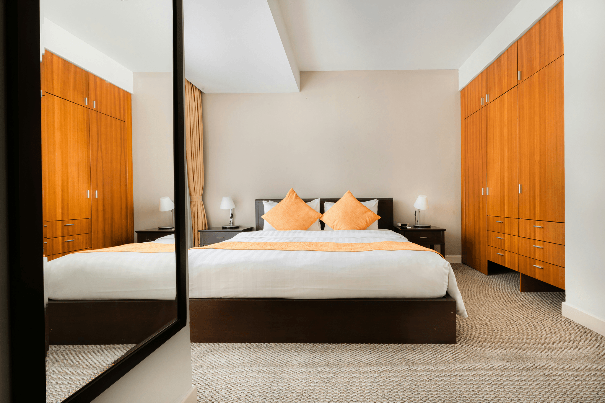 Mirrored Sliding Closet Doors Reflecting Natural Light