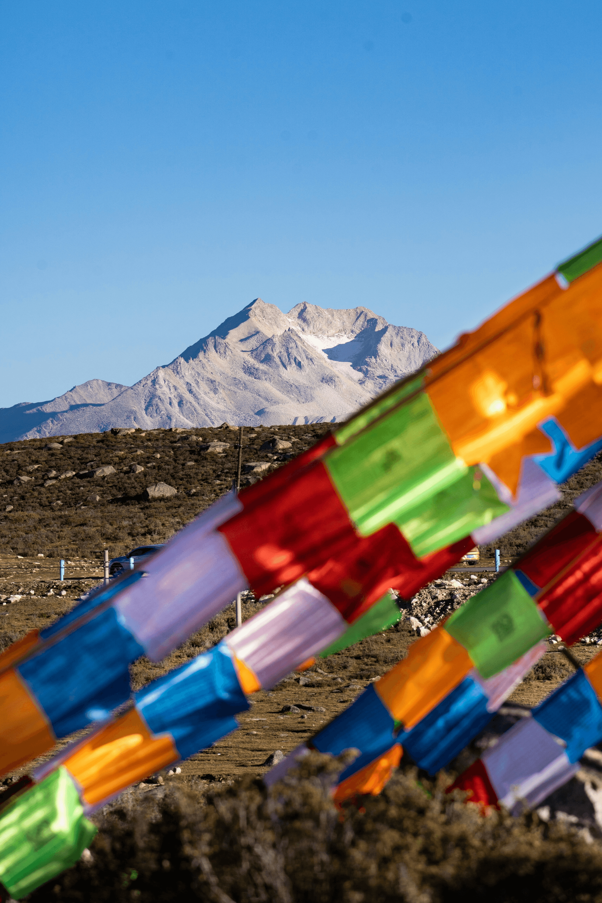 Tibet: Om Mani Padme Hum chant by monk amidst stunning scenery.