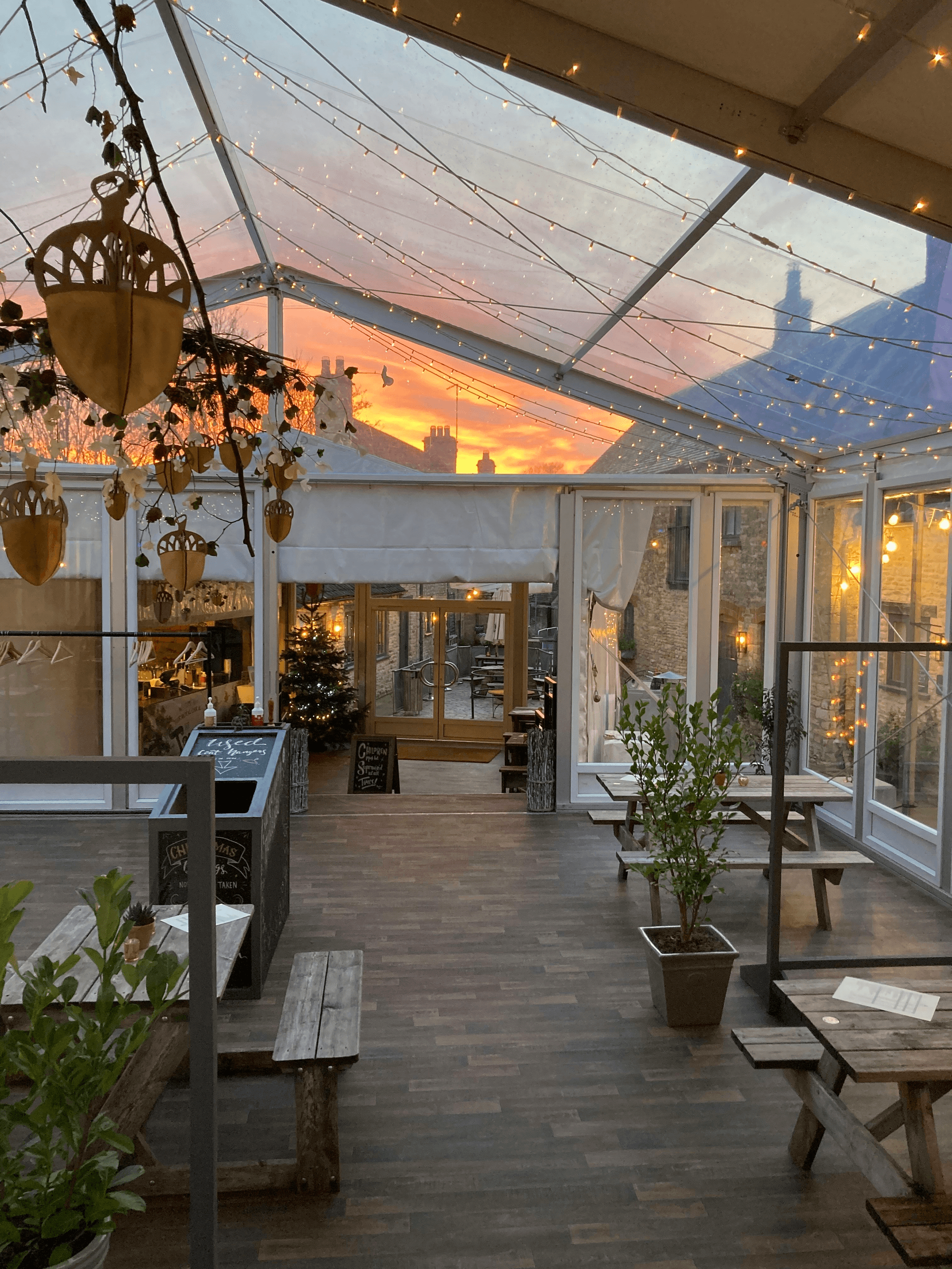 Stunning small container coffee shop design featuring outdoor patio space.