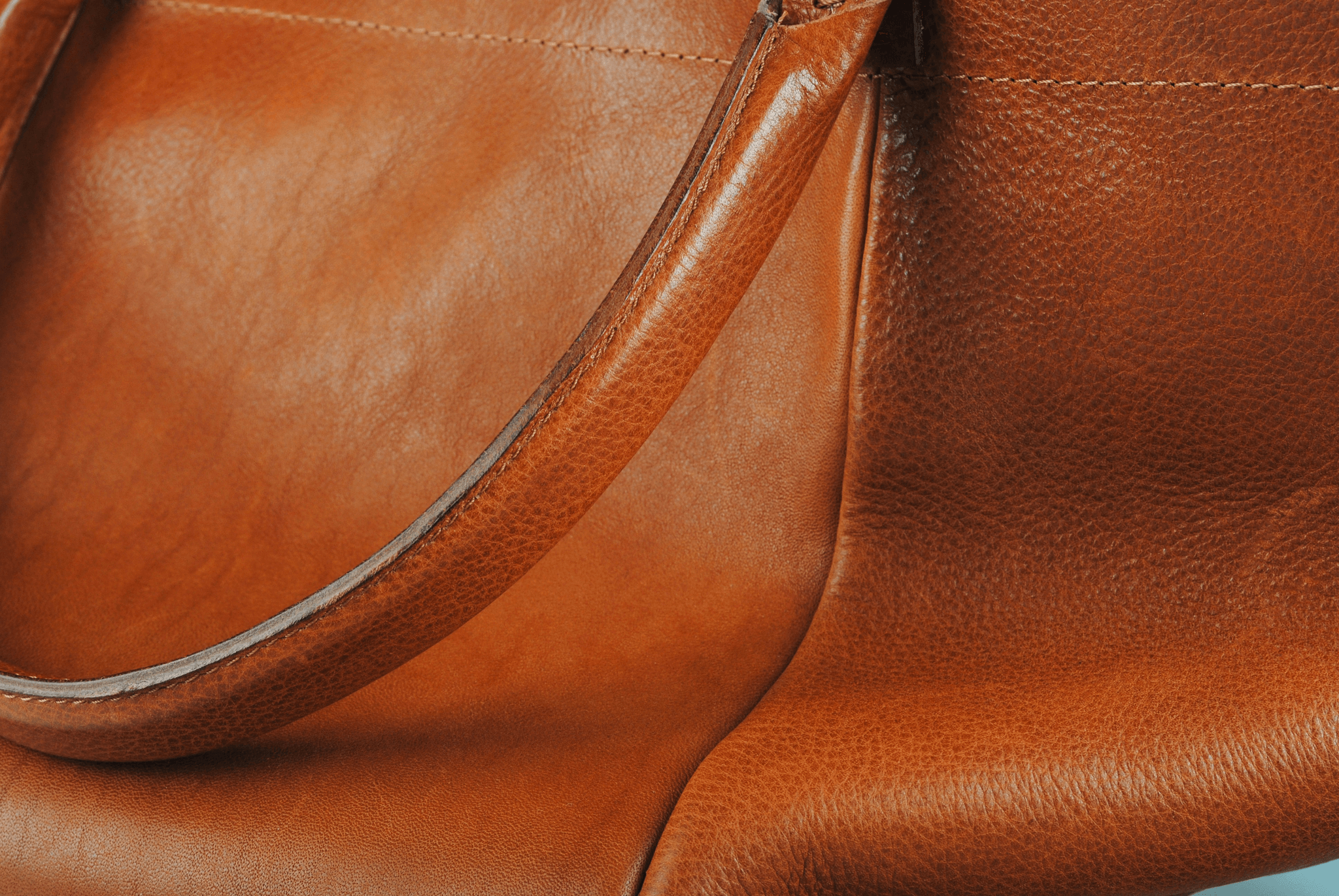 Inspection tests reveal authenticity through aroma in leather bags.