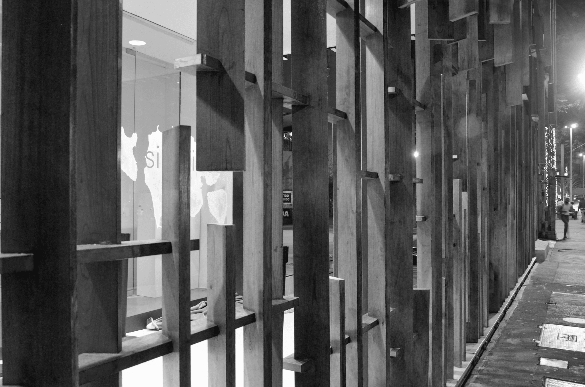 Various types of accordion doors on display in a showroom