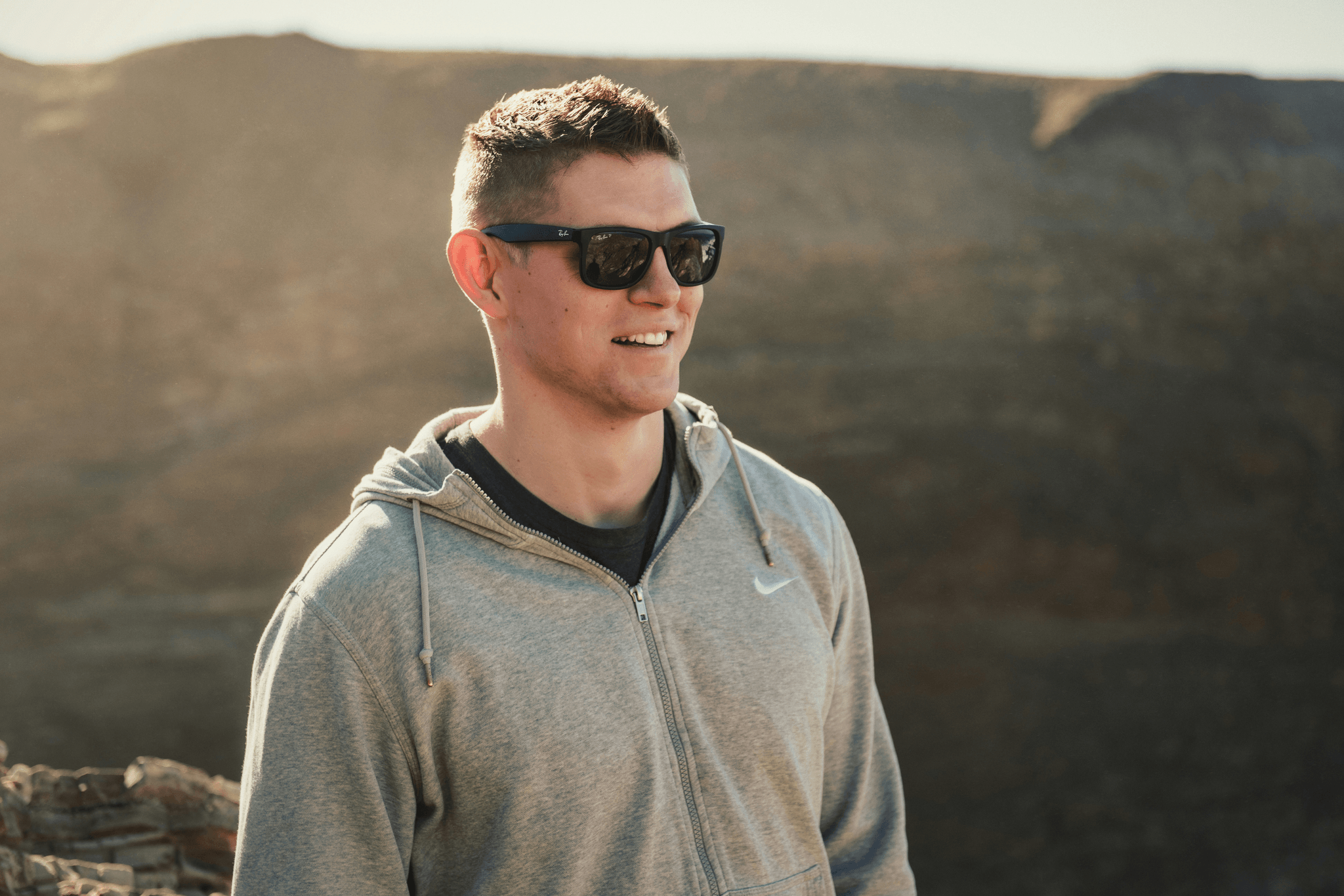 Stylish man showcasing wholesale sunglasses china collection