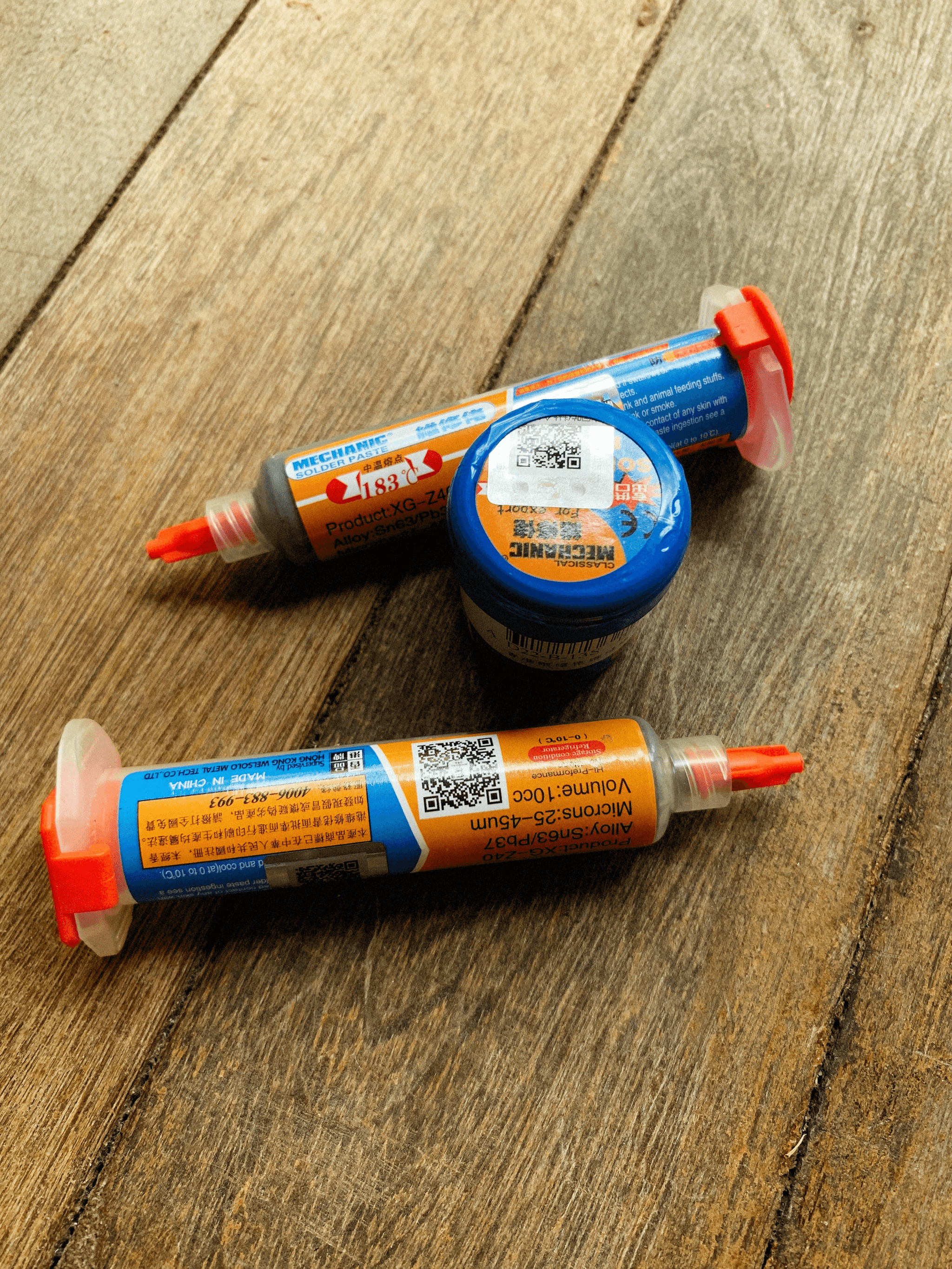 Different types of poly glue on workbench ready for use.