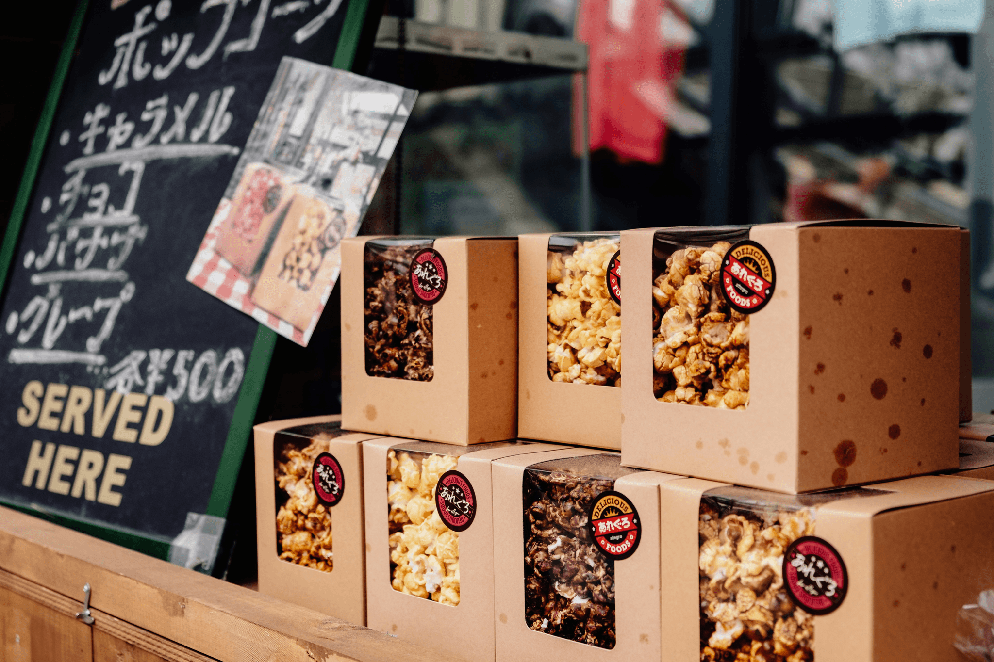 Various custom popcorn boxes showcasing unique designs