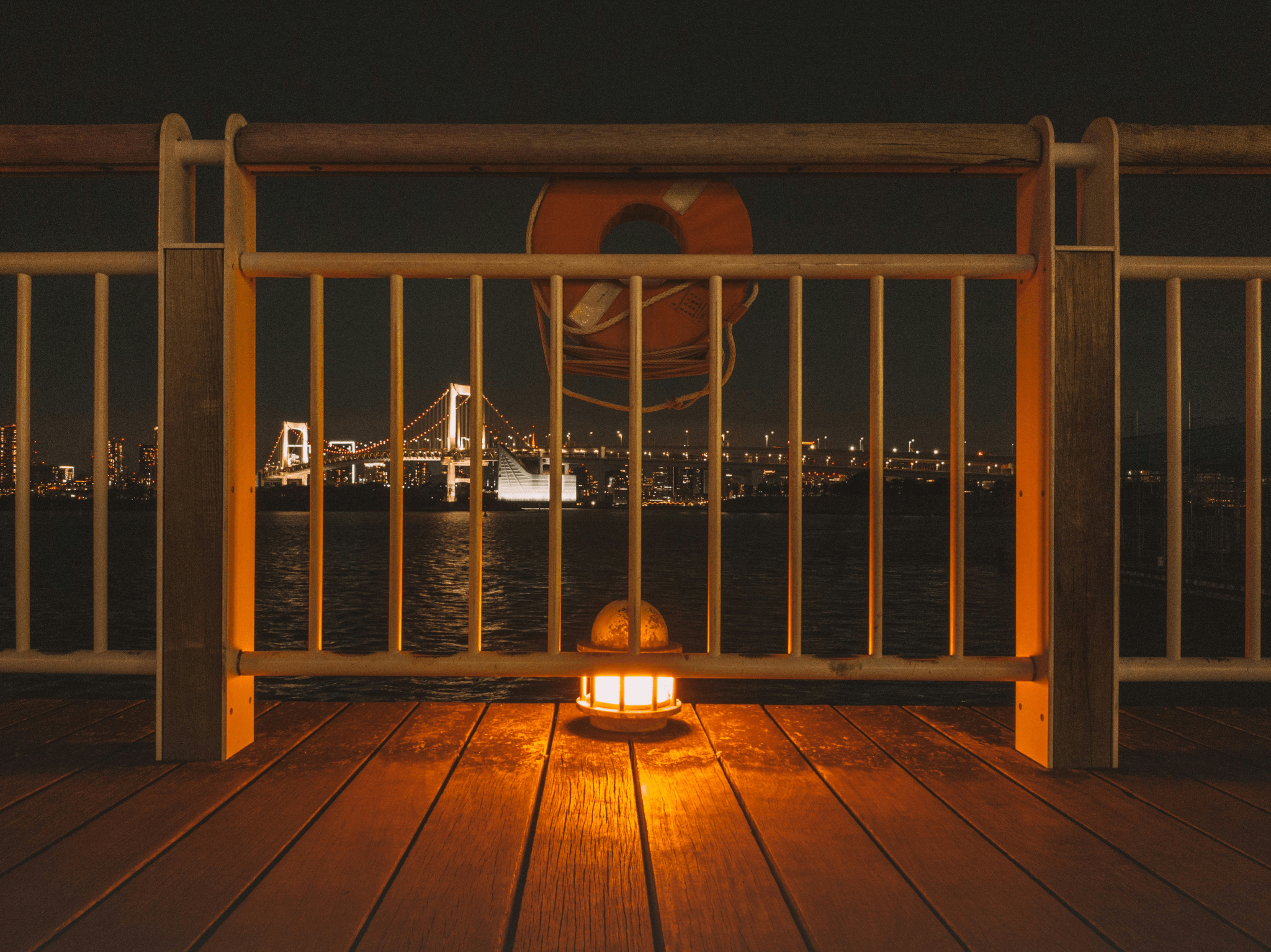 Cozy backyard deck with beautiful lighting