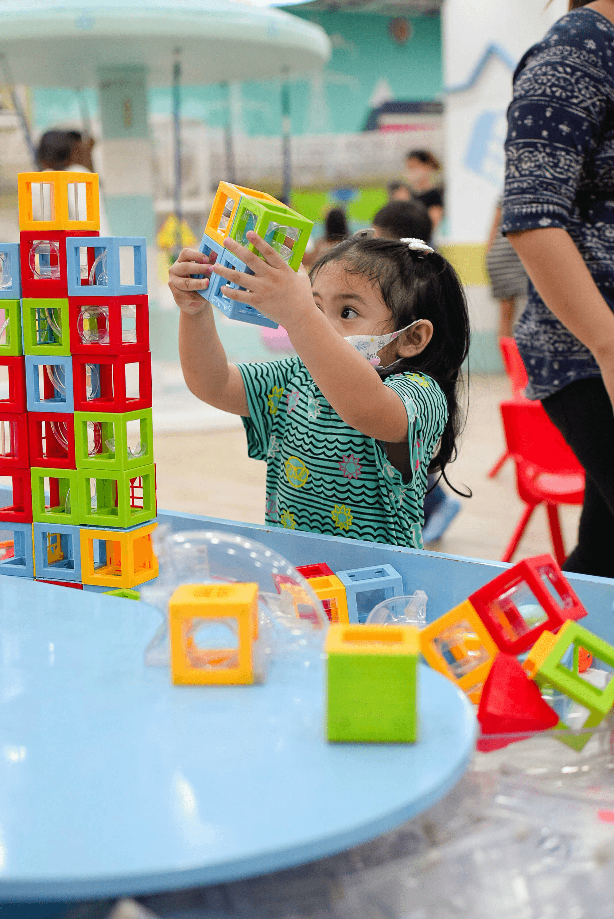 children playing with colorful blocks from a reliable china toys manufacturer