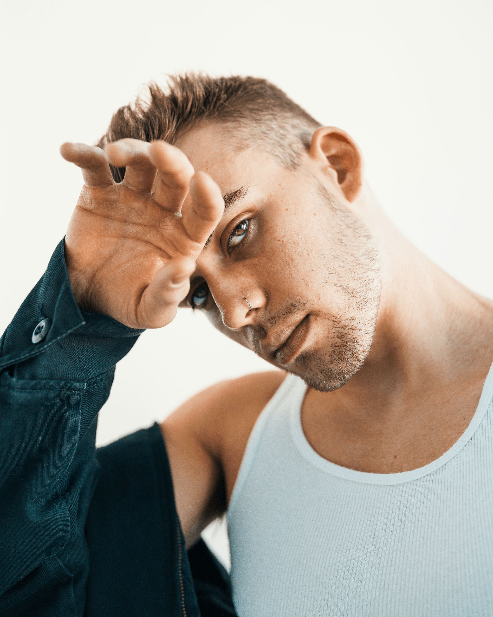 Hair weaving for men: stylish model demonstrating modern man weave.