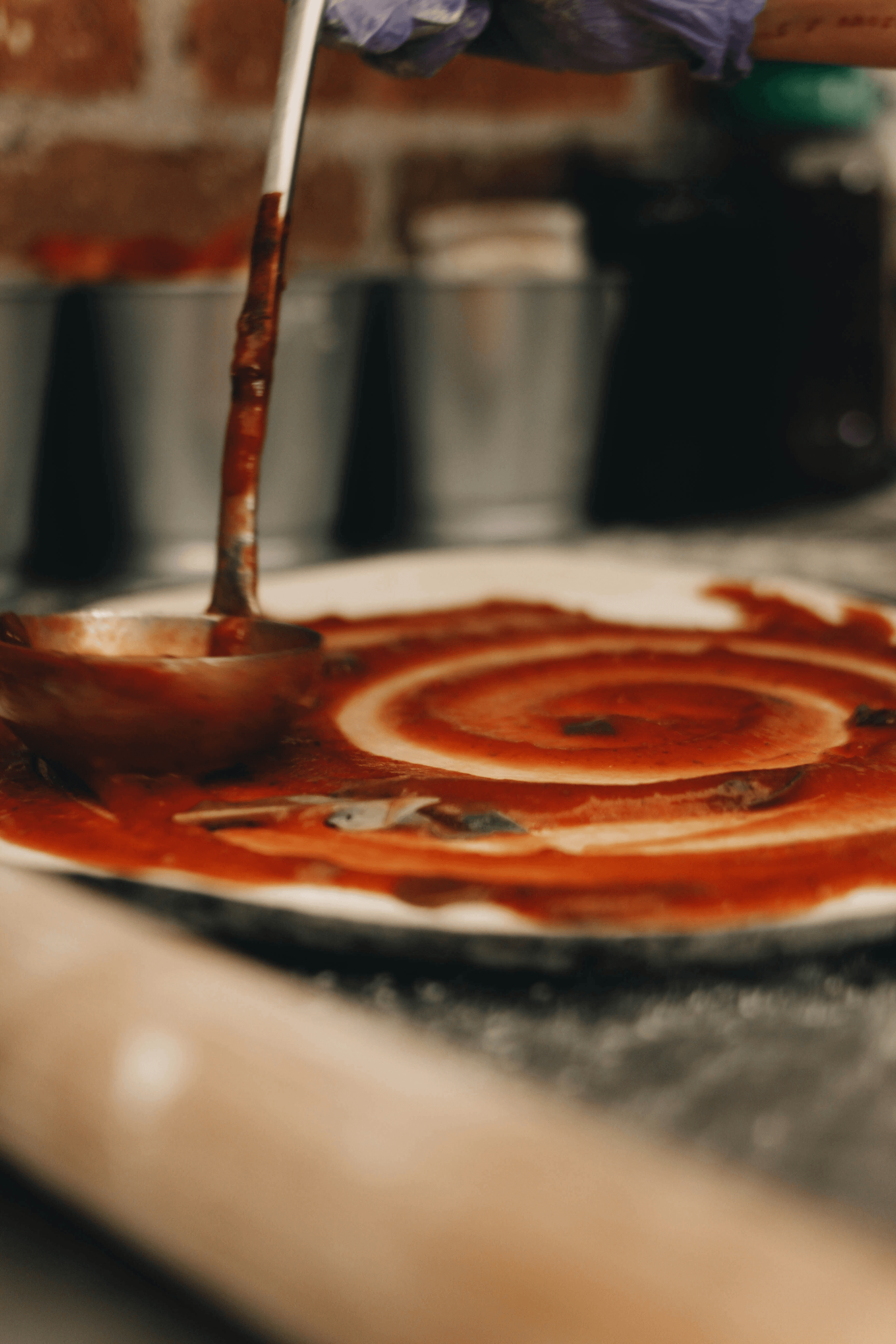 Delicious homemade pizza sauce preparation