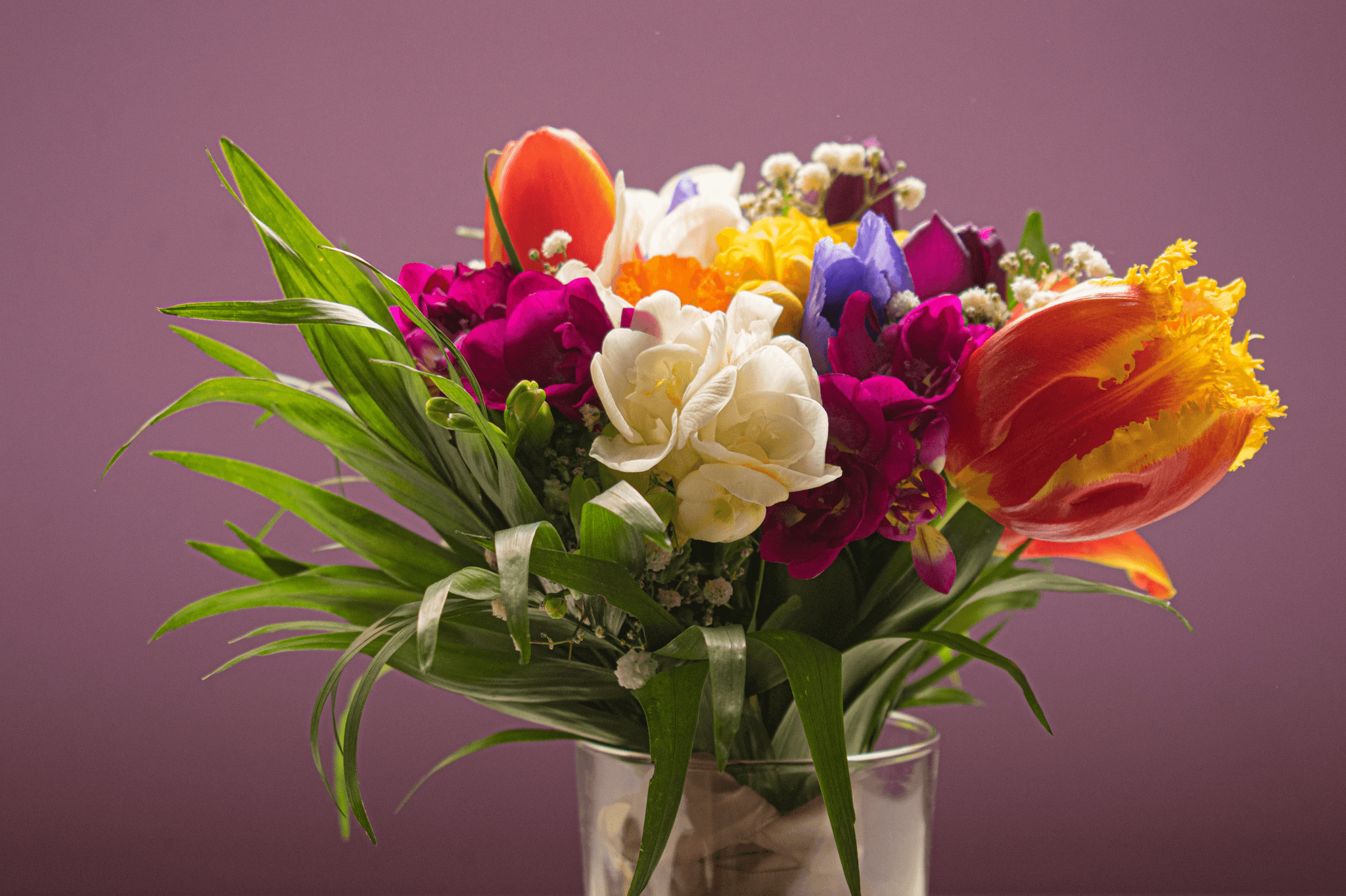 Adelaide flower delivery - Stunning bouquet of colorful flowers arranged in a glass vase
