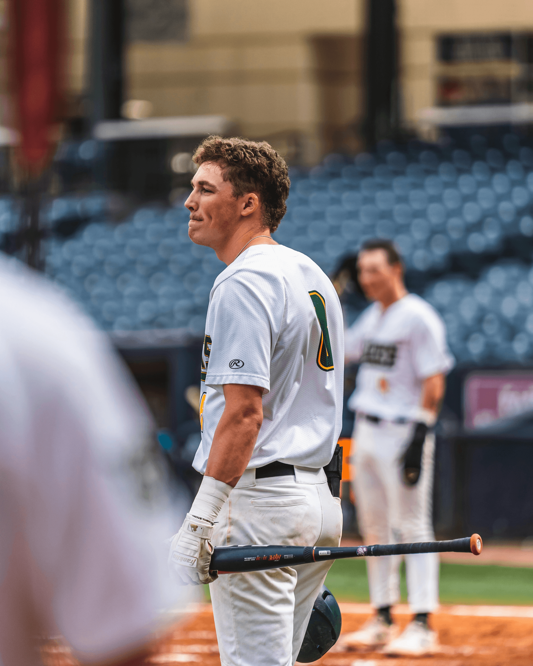 baseball glass worn by player hitting ball