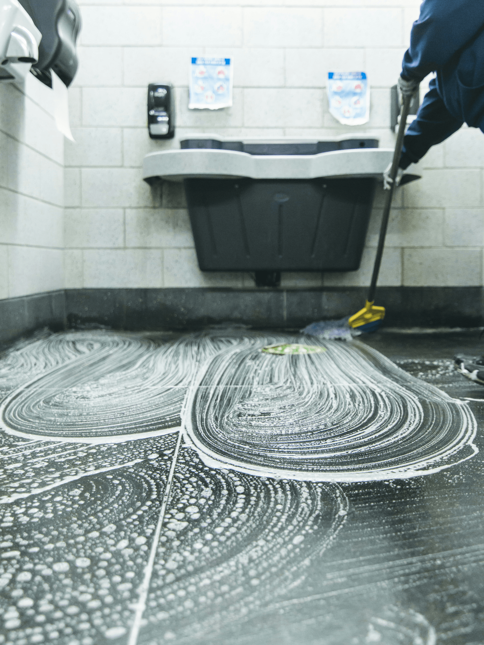 Proper maintenance of floor tiles through mopping