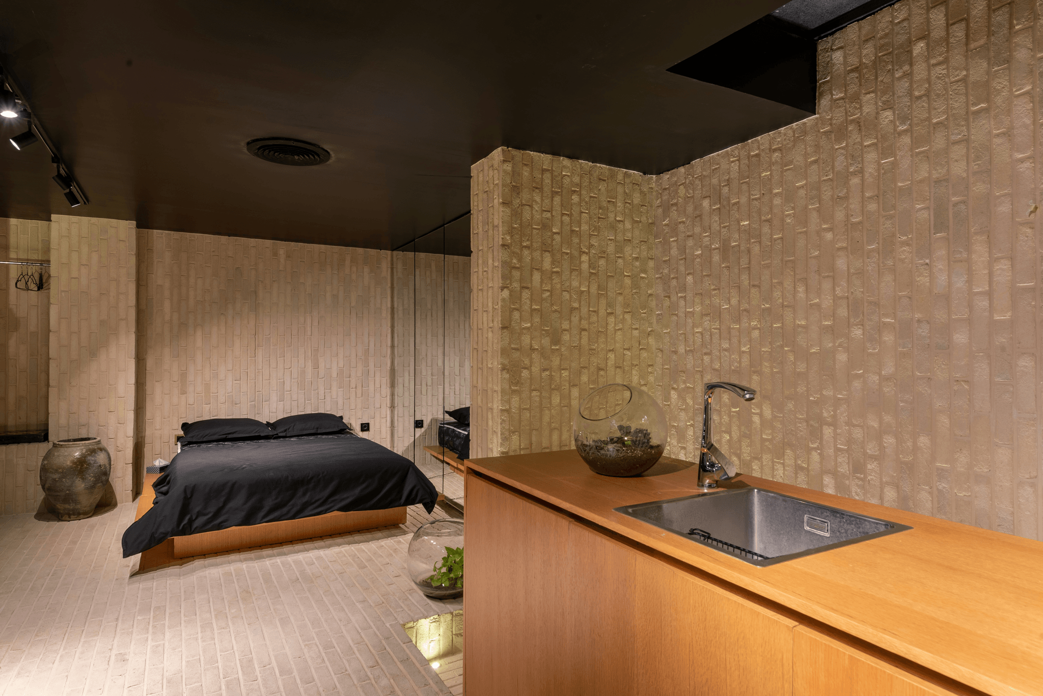 Cozy sleeping pods in space capsule hotel providing privacy.