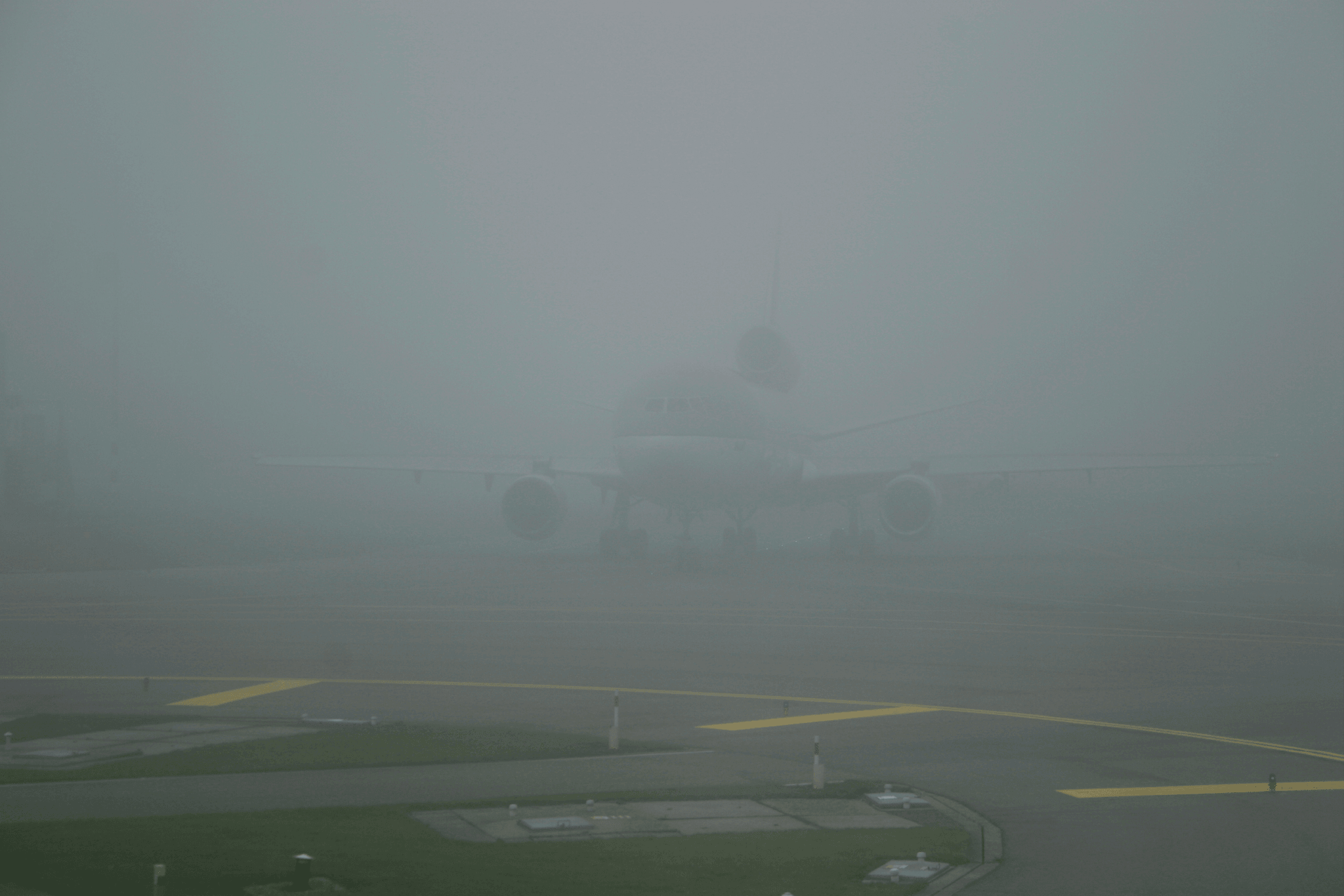 How much visibility is needed to land a plane during foggy conditions